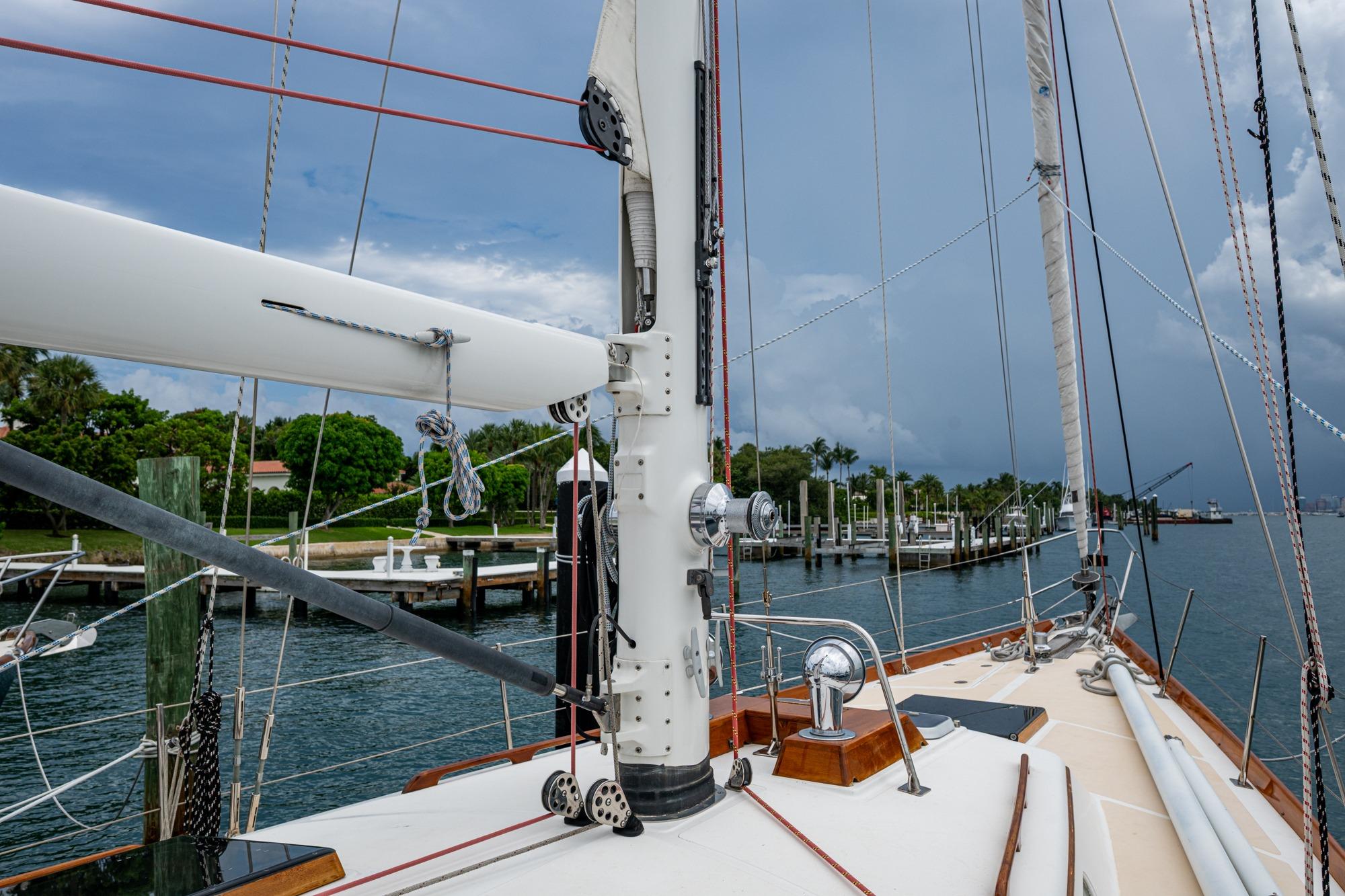 Hinckley Sou'wester Stoway Sloop 2000 sailboat docked, showcasing mast and rigging.