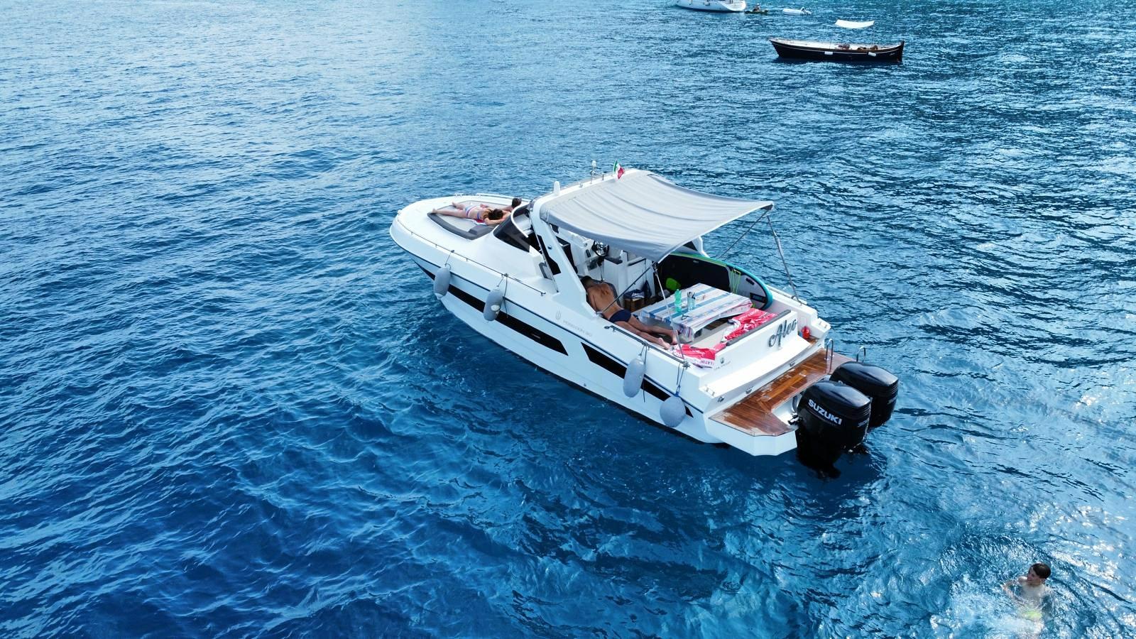 Aerial view of 2020 Poseidon CML Yacht Poseidon 3.0 on blue ocean water.