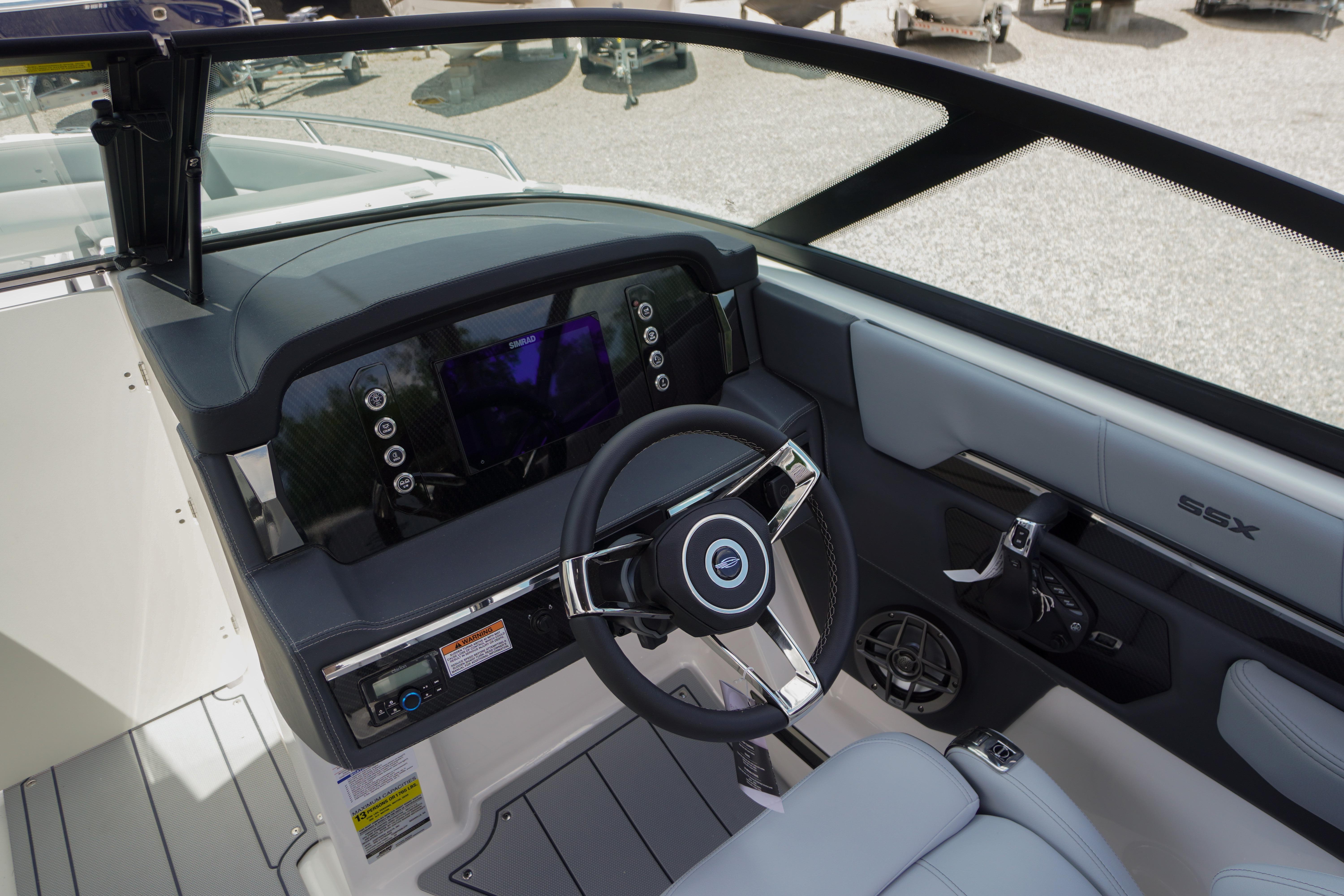 2026 Chaparral SSX 4 boat cockpit with modern steering and dashboard controls.