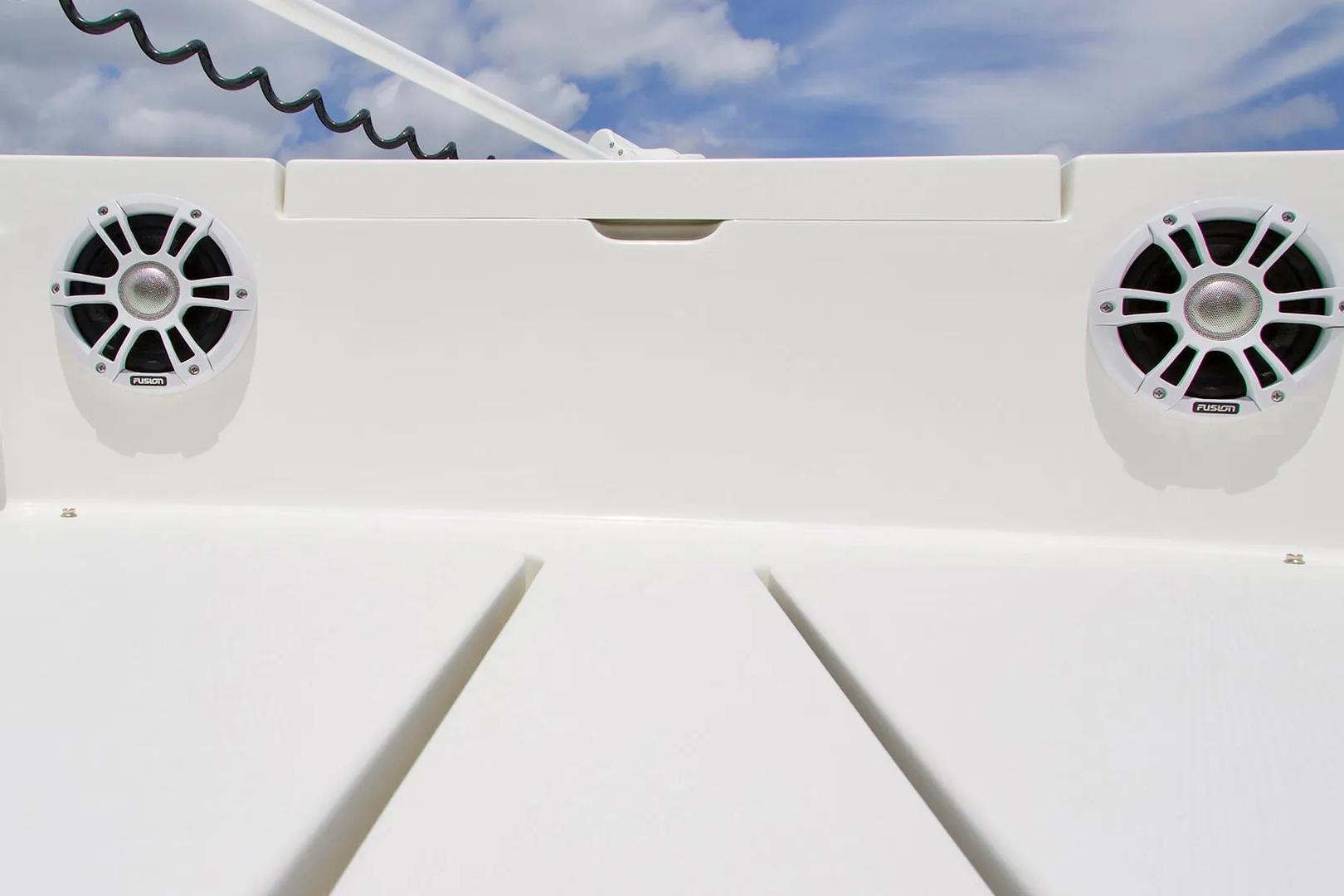2027 Regulator 24XO boat speakers against a clear sky background.