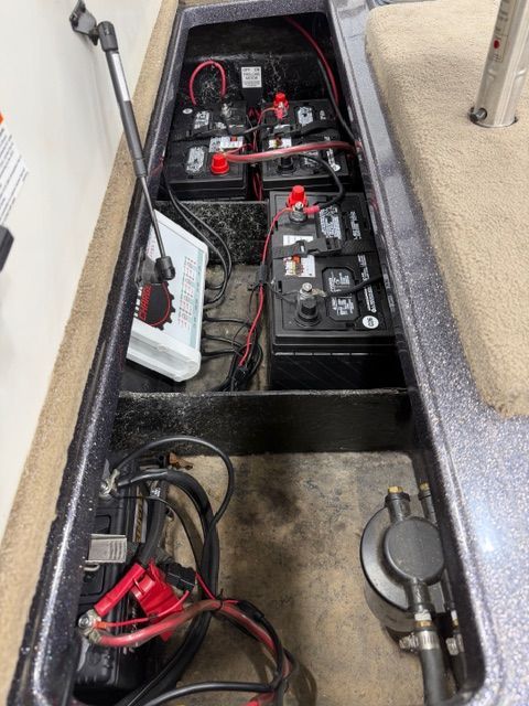 Battery compartment of 2011 Ranger Z520 Comanche boat with wiring.