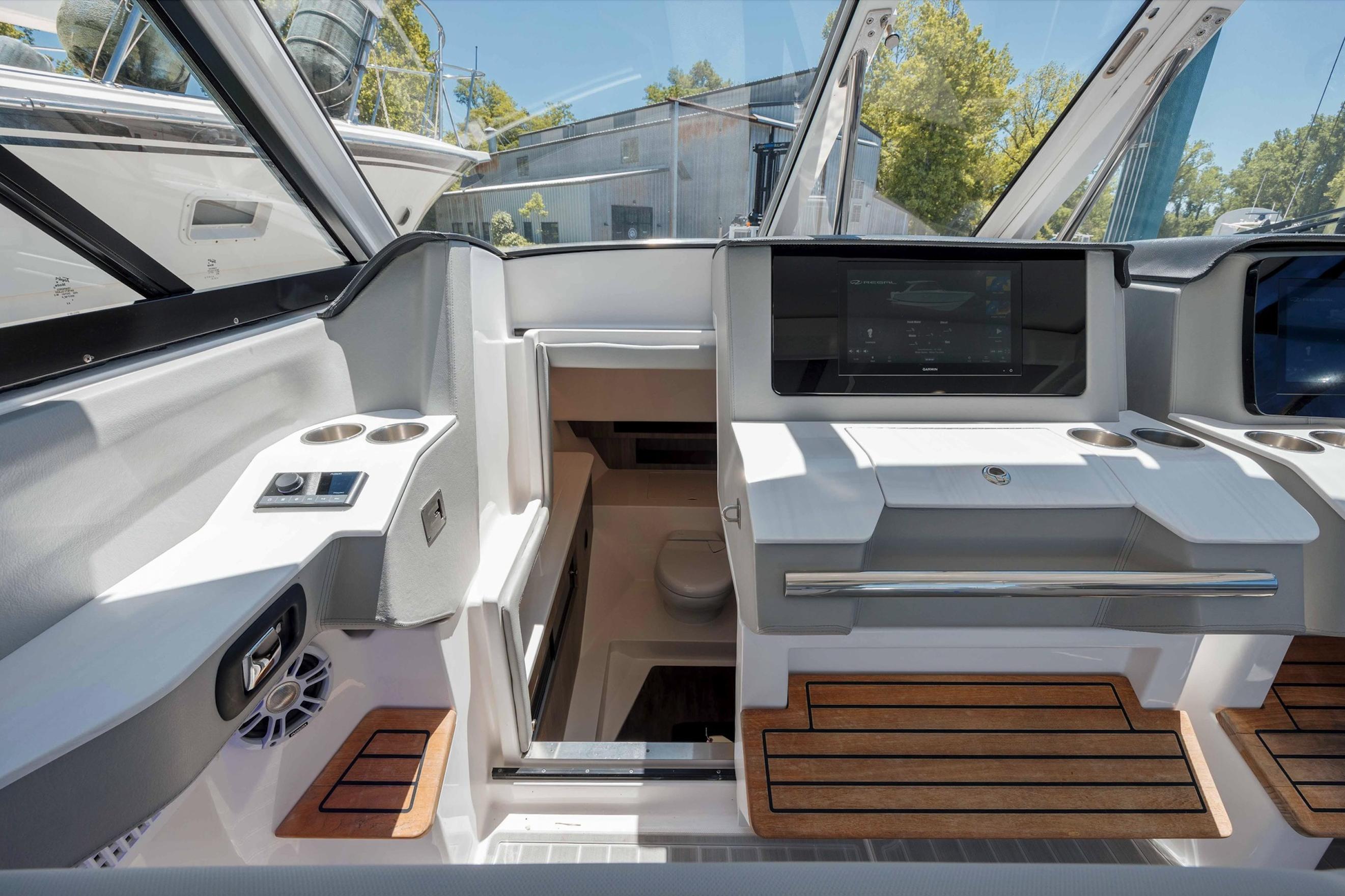 2022 Regal LX36 boat interior with modern dashboard and wooden accents.