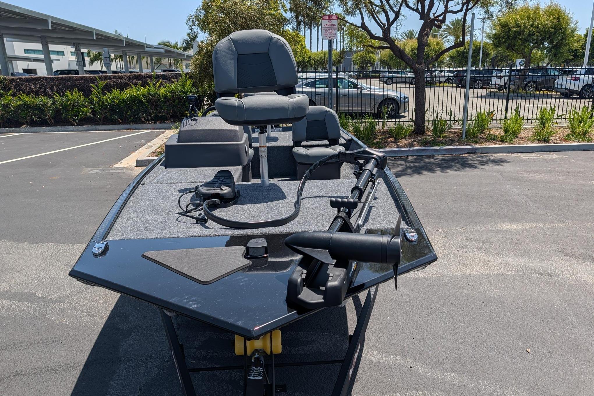 2026 Tracker Bass Tracker Classic XL boat parked in a sunny lot.