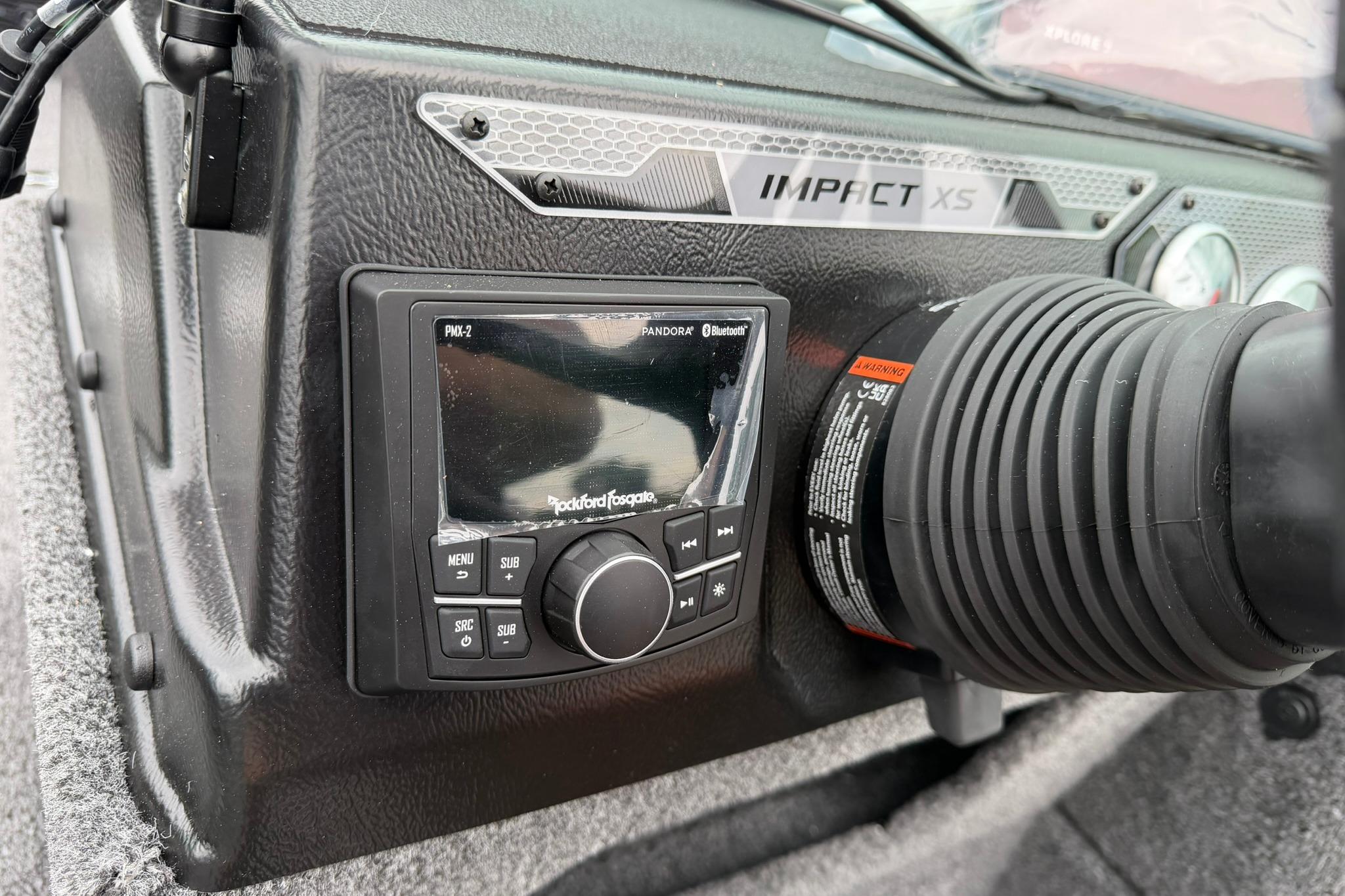 Dashboard of 2027 Lund 1875 Impact XS Sport with Rockford Fosgate audio system.