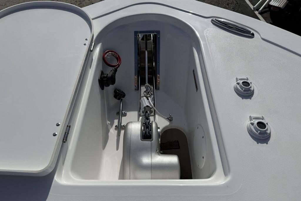 Anchor compartment of 2026 Tidewater 232 LXF boat, featuring modern design and equipment.