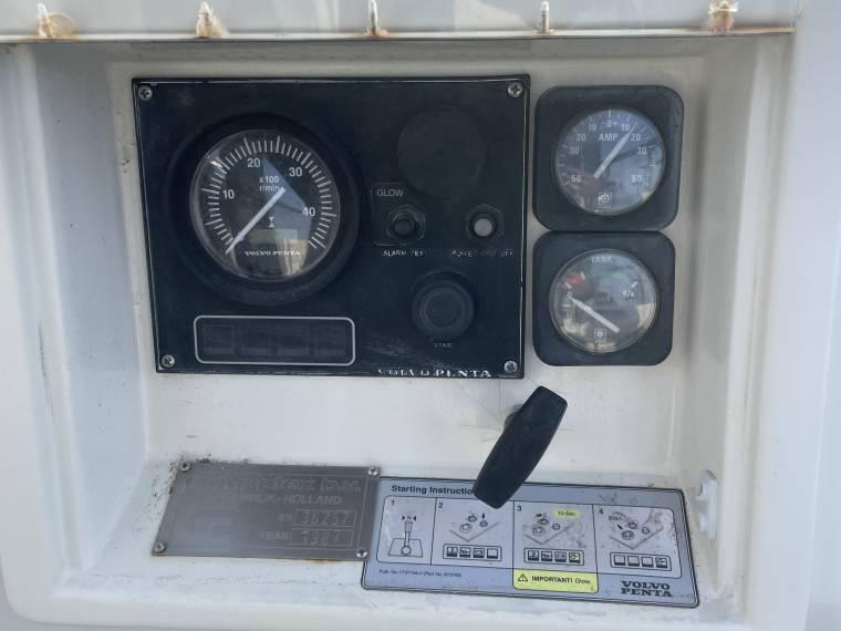 Control panel of a 1987 Contest Yachts 36 with Volvo Penta gauges and instructions.