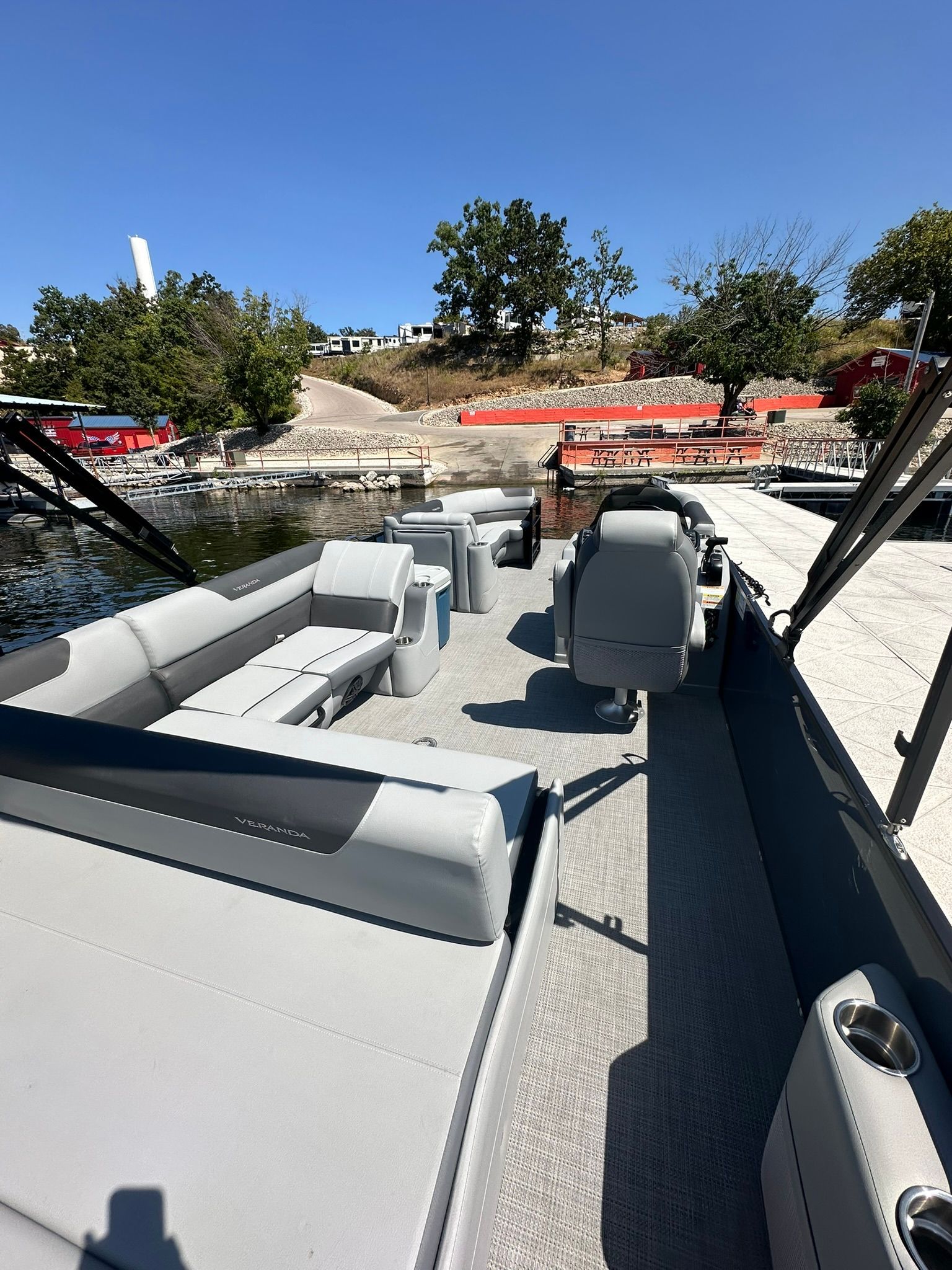 2023 Veranda Relax VR25VLB pontoon boat at dock.