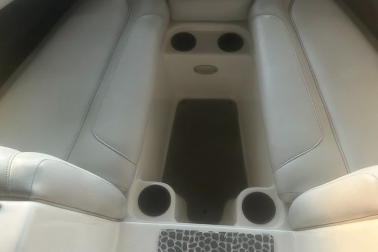 Interior of a 2003 Centurion Avalanche boat with seating.