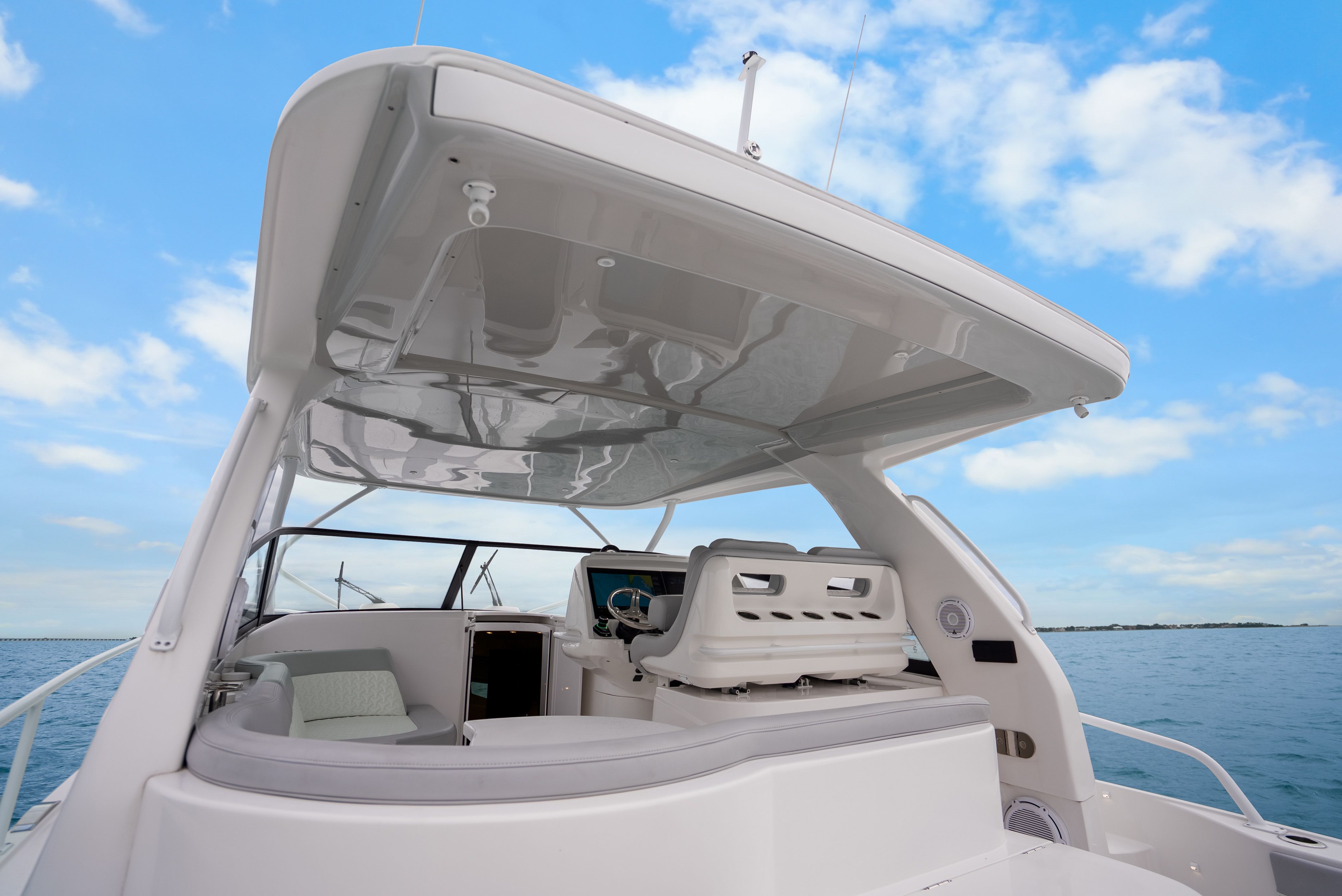 Intrepid 477 Evolution 2024 yacht with modern cockpit design.