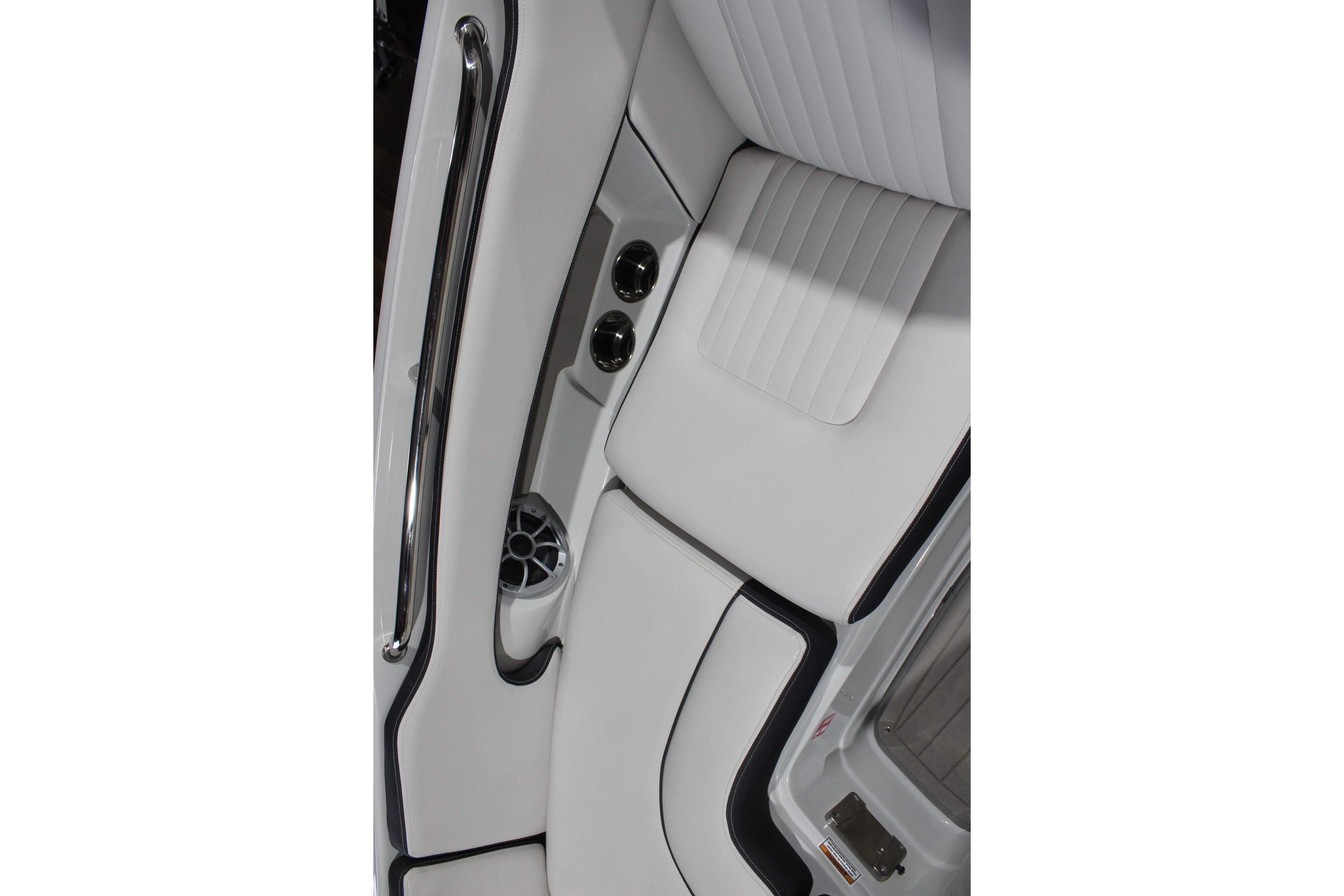 2026 Crownline 278 SS interior with sleek white seating and chrome accents.