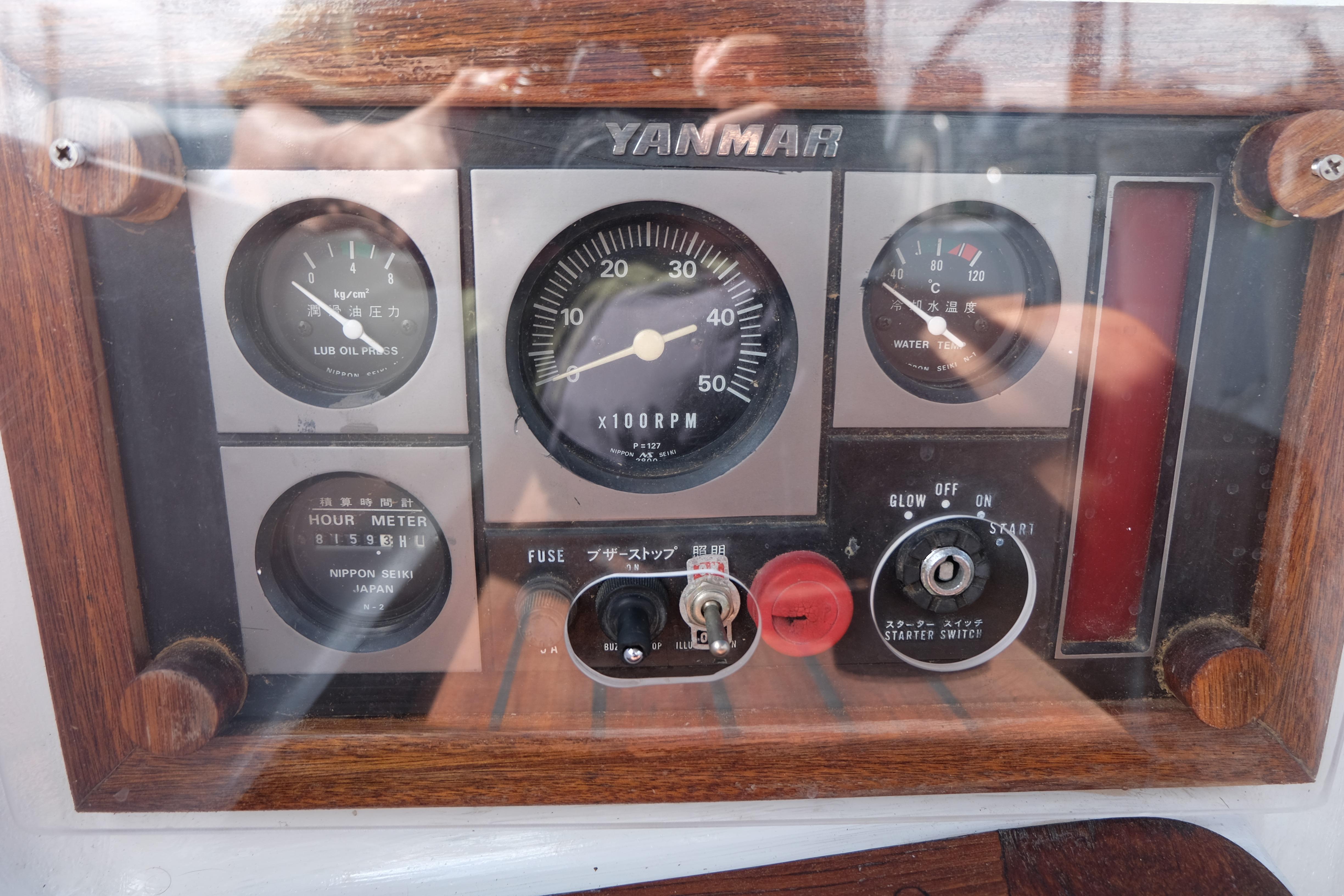Control panel of a 1986 Martzcraft 35 boat with Yanmar engine gauges.