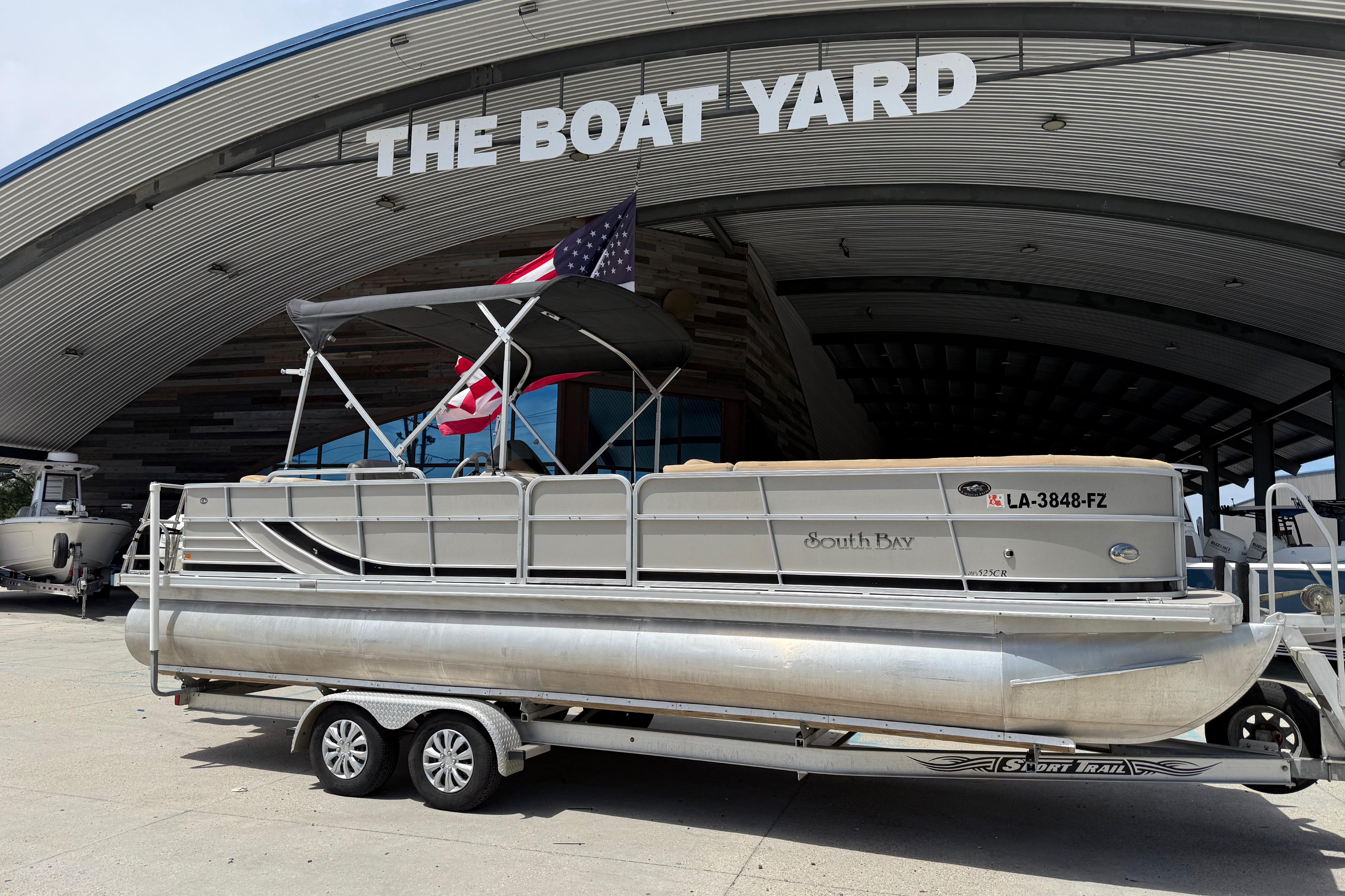 2012 South Bay 522 CR pontoon boat on trailer at The Boat Yard.