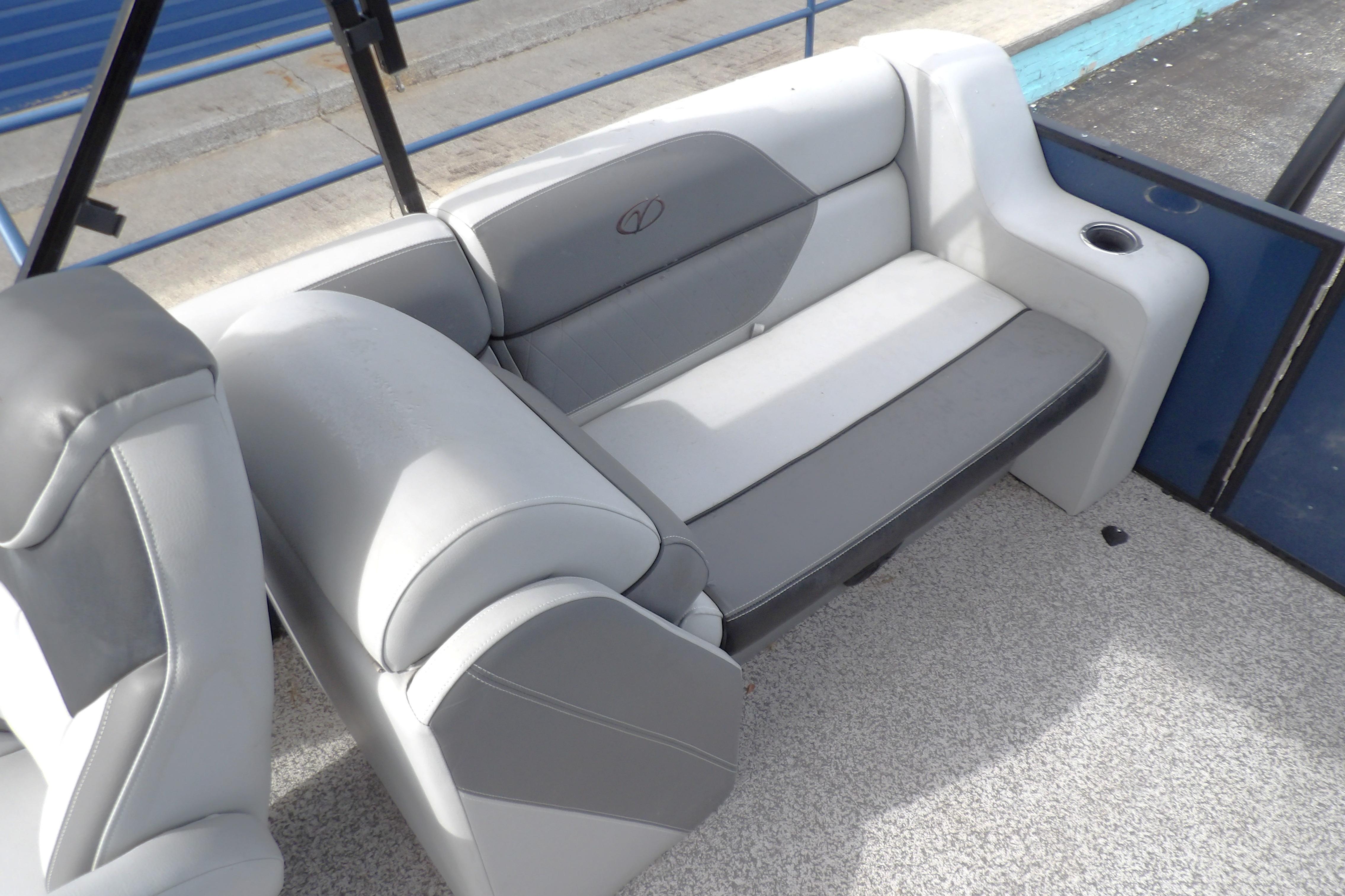 2022 Veranda Vista View 22RC boat seating with gray upholstery and cup holder.