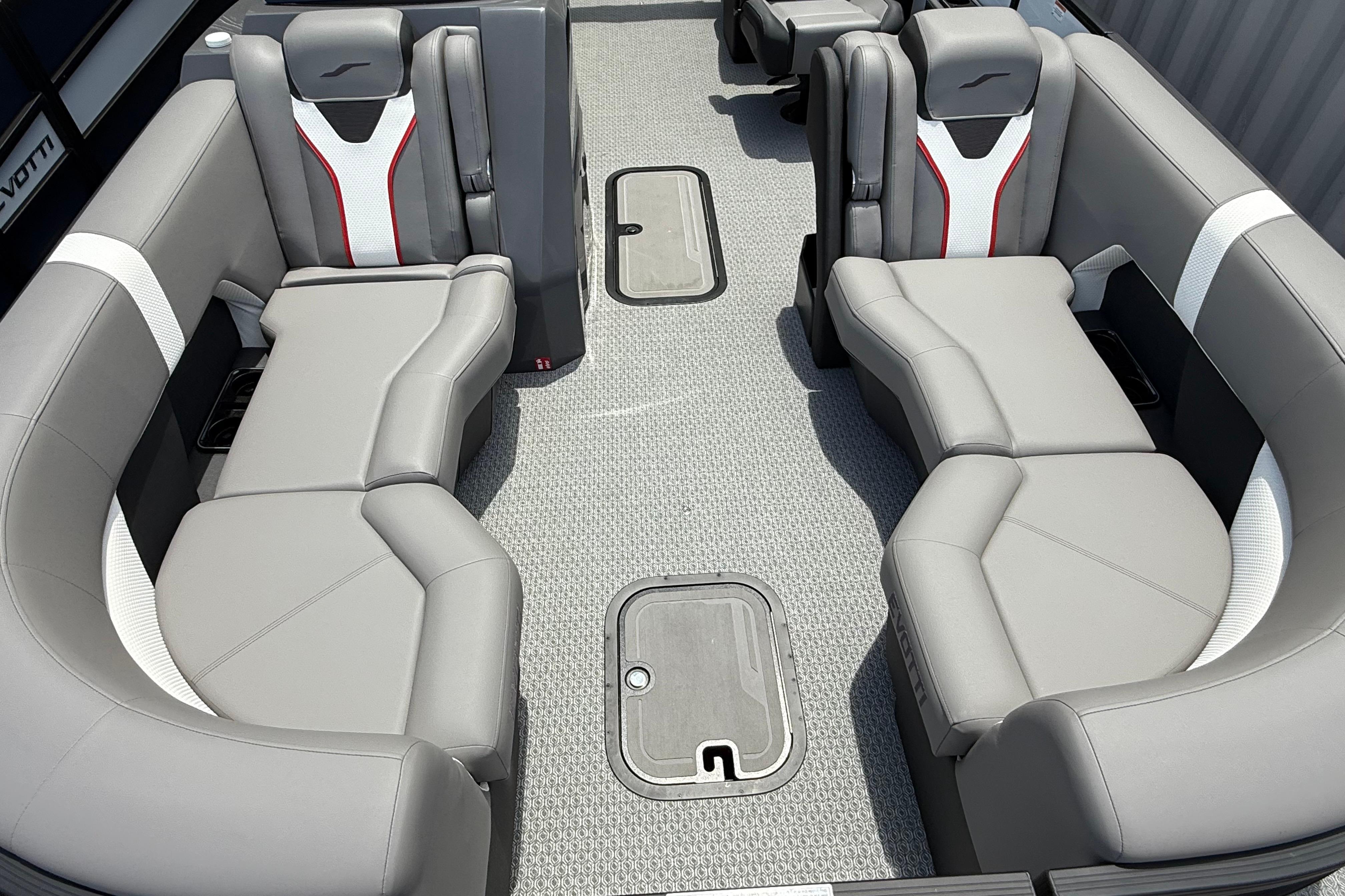 Luxurious seating in a 2026 Evotti 723QL boat, featuring sleek gray upholstery and modern design.