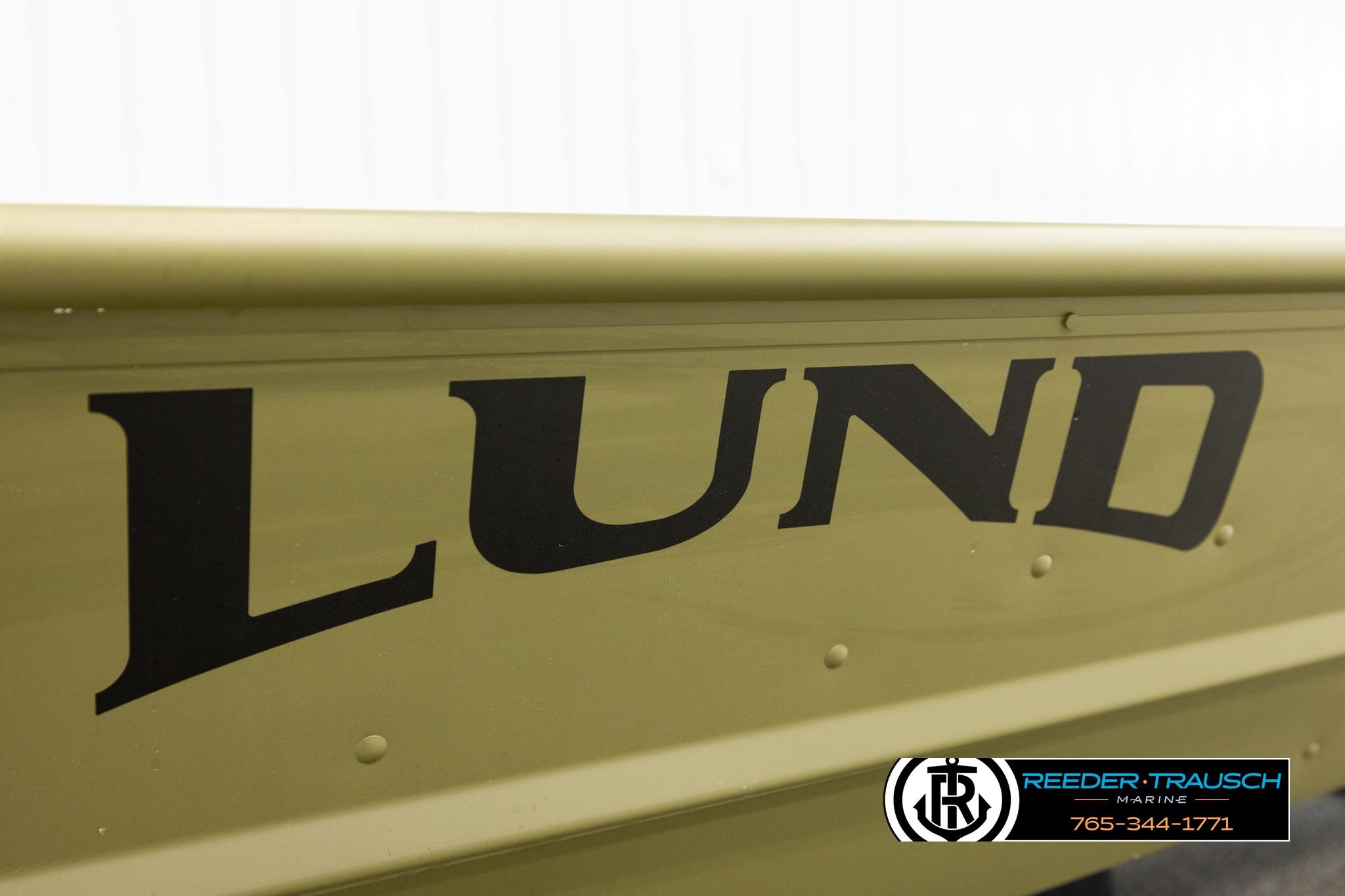 2025 Lund 1240 boat side view with logo and Reeder-Trausch Marine branding.