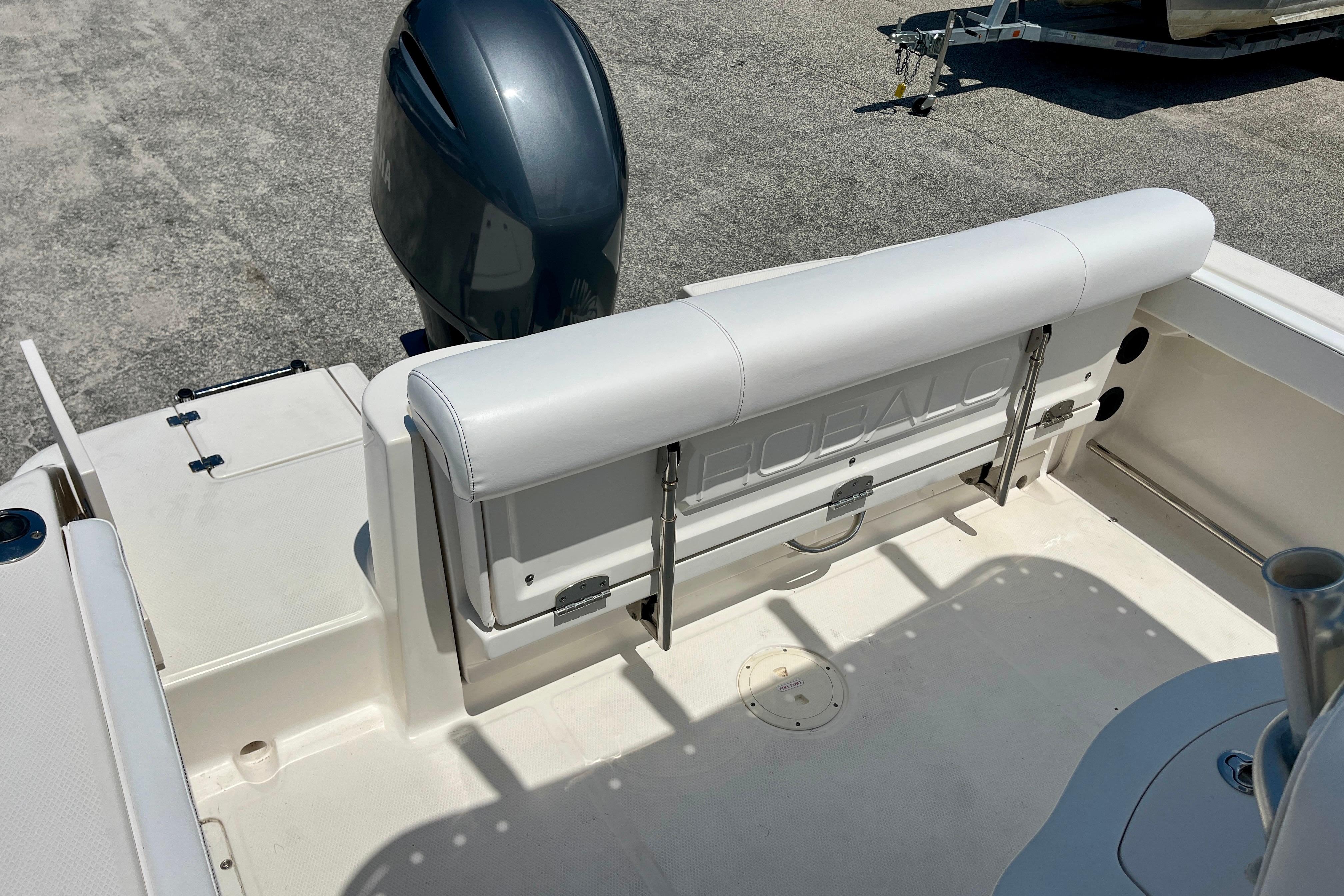 2016 Robalo R222 Center Console boat interior with seating and engine view.