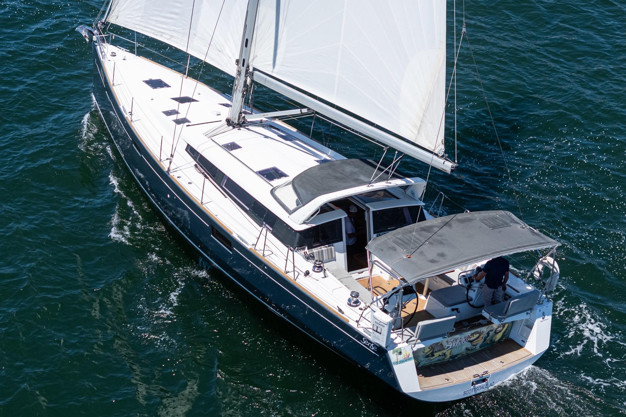 2017 Beneteau Sense 50 sailing yacht cruising on open water.