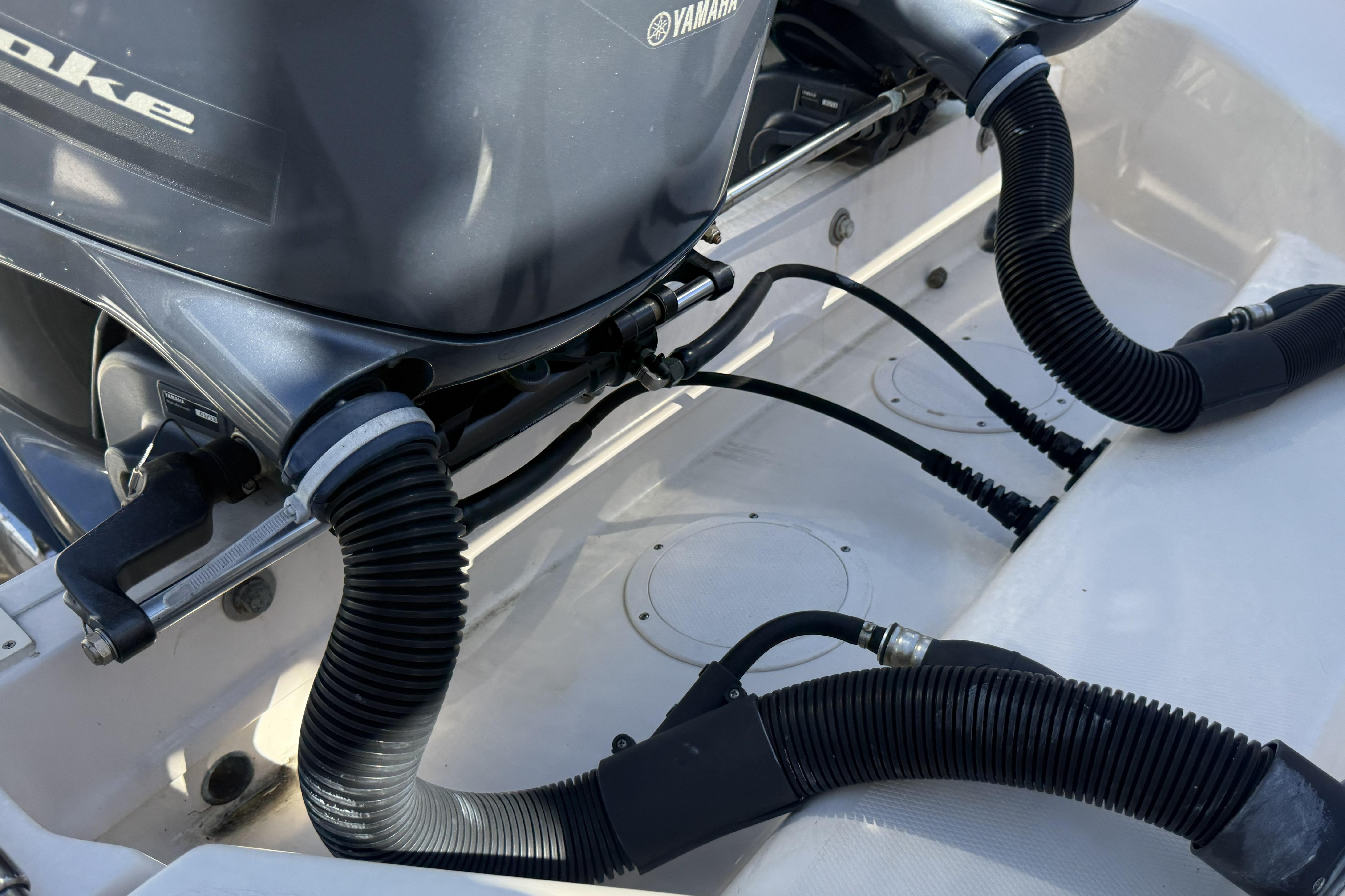 2014 Grady-White Freedom 275 boat engine with Yamaha components and hoses.