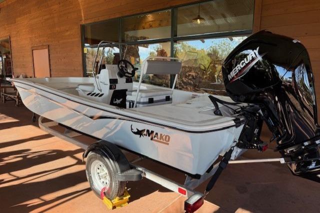2026 Mako Pro Skiff 17 CC boat with Mercury engine on trailer.