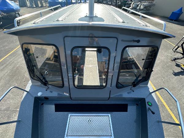 2024 Spartan 260 Maximus Pro XL boat, rear view of cabin and deck.