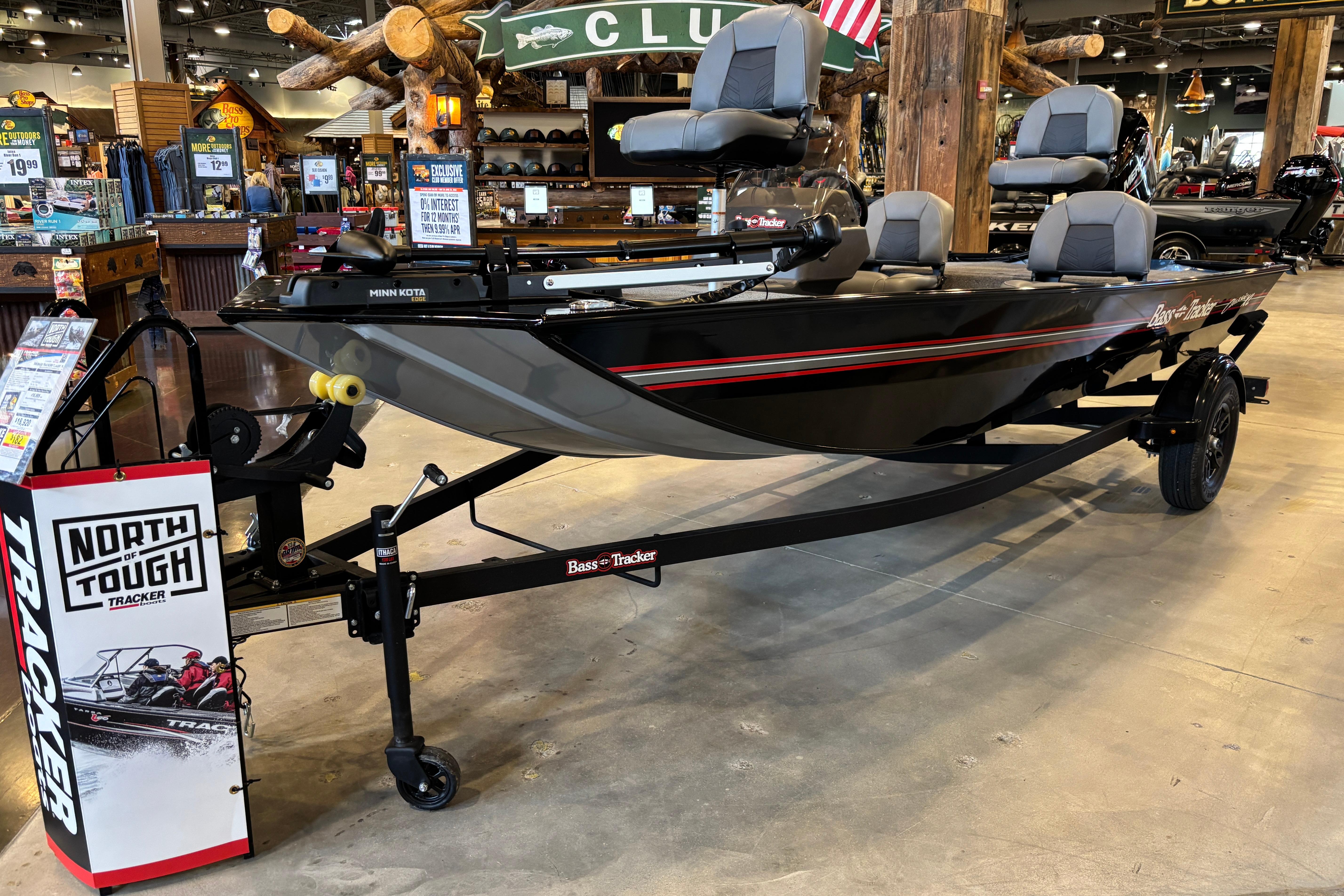 2026 Tracker Bass Tracker Classic XL boat displayed indoors on a trailer.