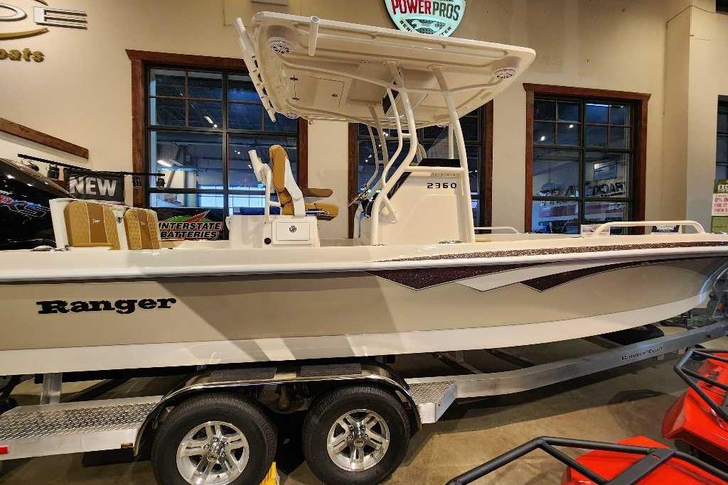 2025 Ranger 2360 Bay boat displayed indoors on a trailer.