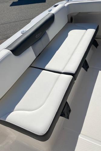 2024 Robalo R222 Center Console boat with cushioned seating.