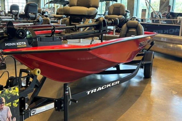 2026 Tracker Pro Team 175 boat in showroom, featuring Minn Kota Maxxum motor.