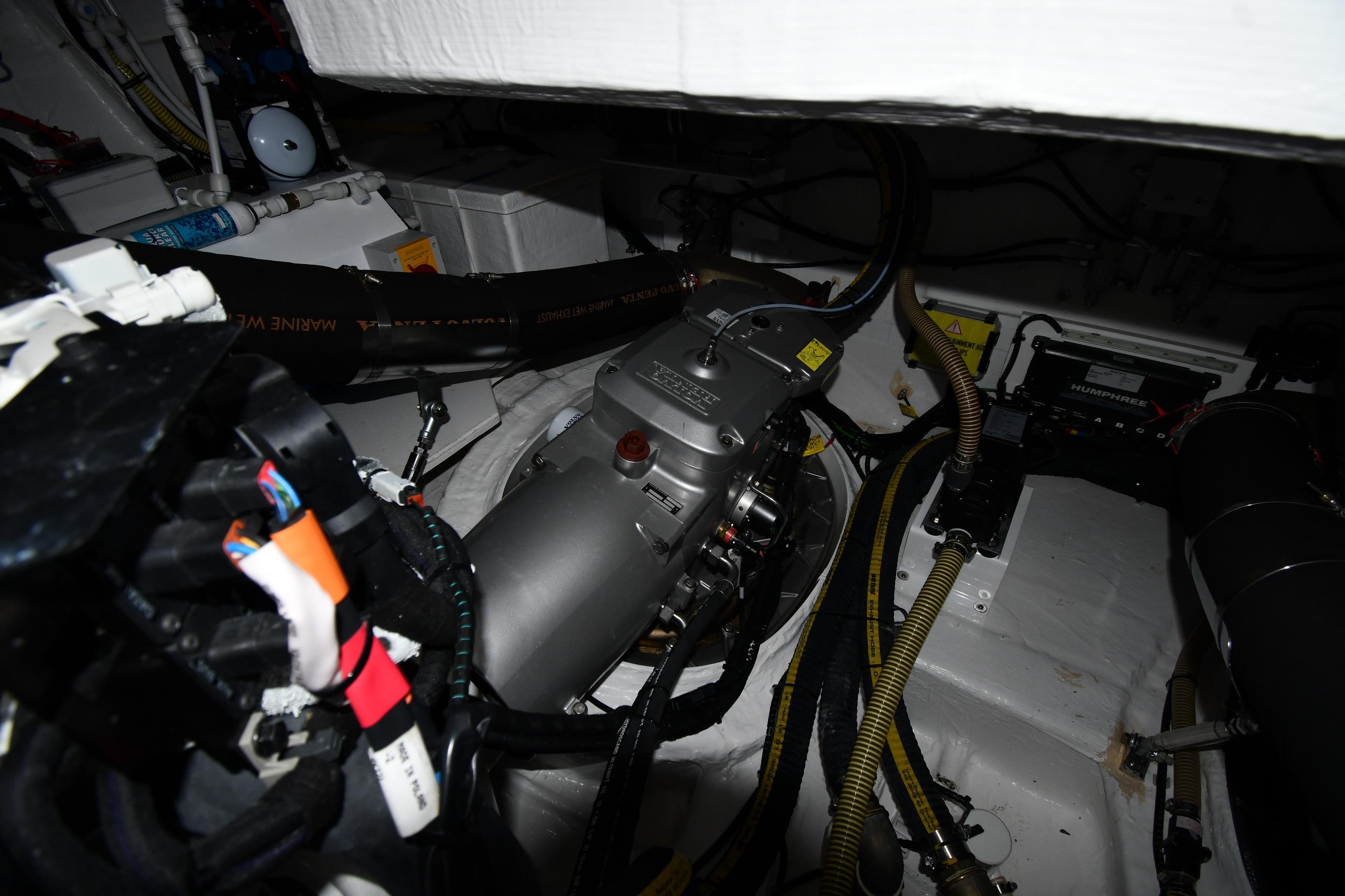 Engine room of 2024 Fairline G50 Targa yacht, showcasing mechanical components and wiring.