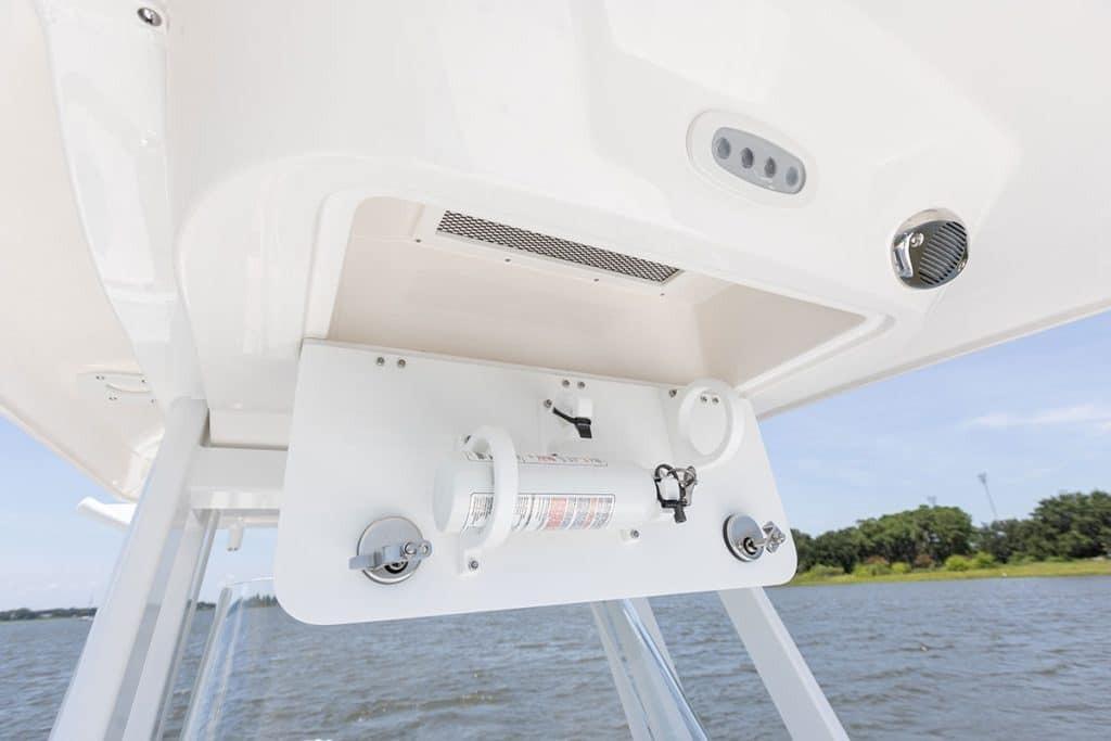 2027 Sea Fox 231 Bay Fox boat console with safety equipment and controls.