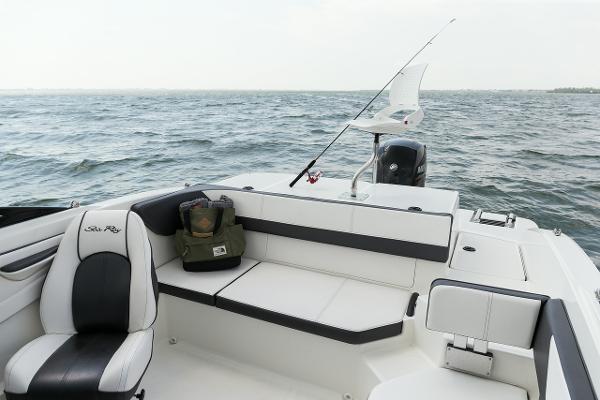 Manufacturer Provided Image: 2015 Sea Ray 19 SPX OB boat interior with fishing rod and gear on open water.