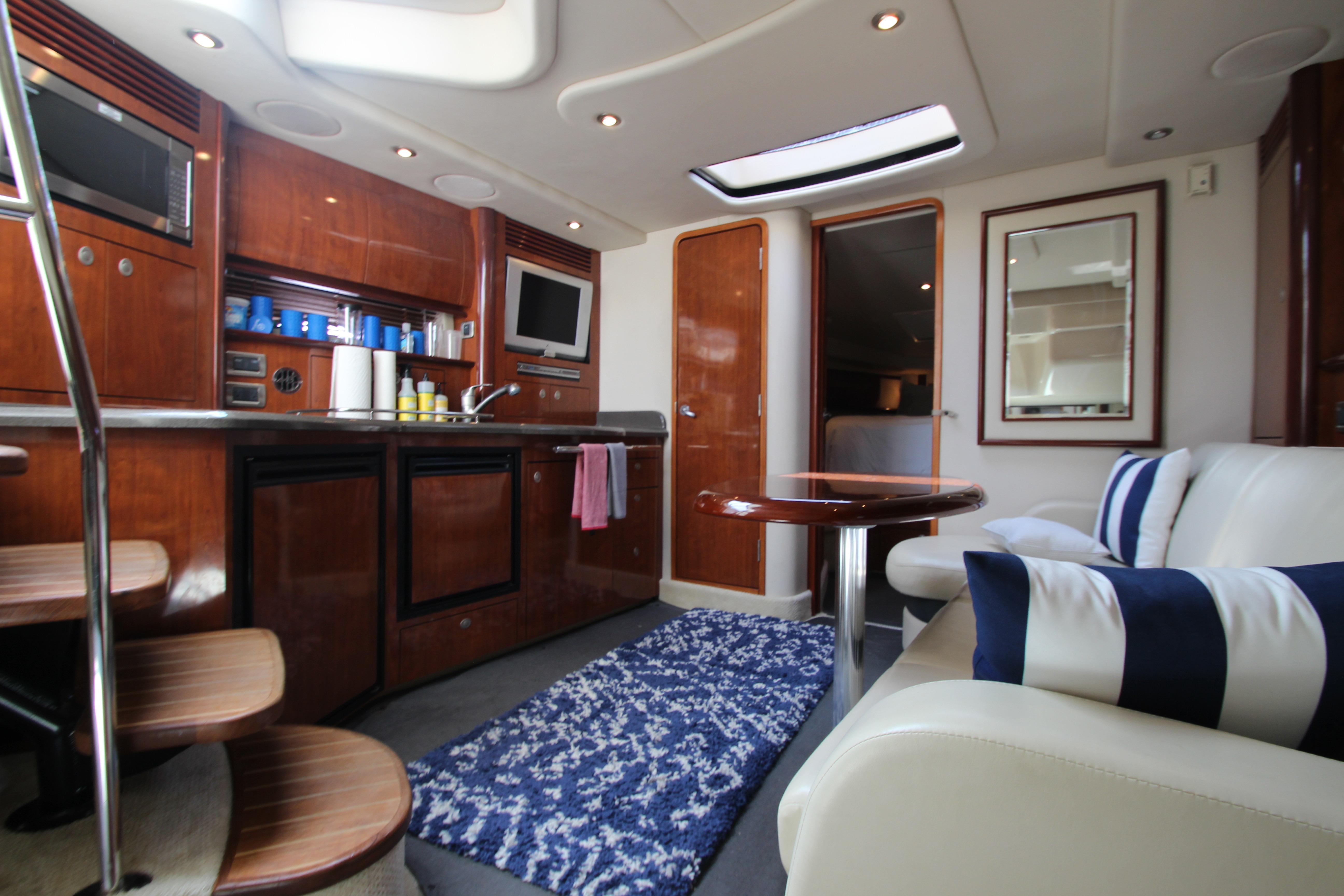 Luxurious interior of 2004 Sea Ray 40 Sundancer yacht with modern amenities and elegant design.