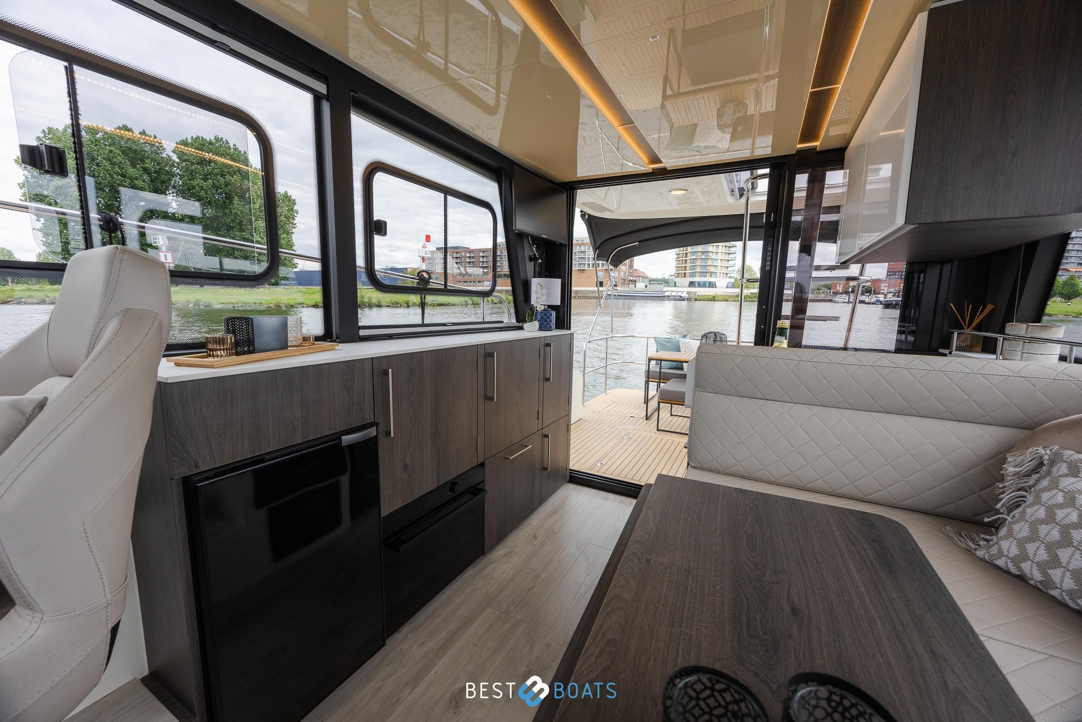 Luxurious interior of 2023 Cobra Yachts Futura 36 Premium Fly, featuring modern design and waterfront view.