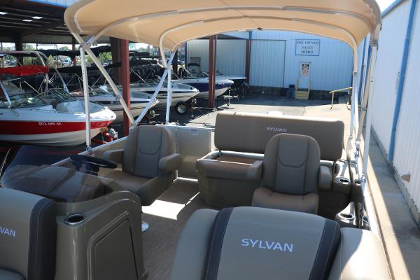 2025 Sylvan Mirage 820 CLZ DH pontoon boat interior with seating and canopy.