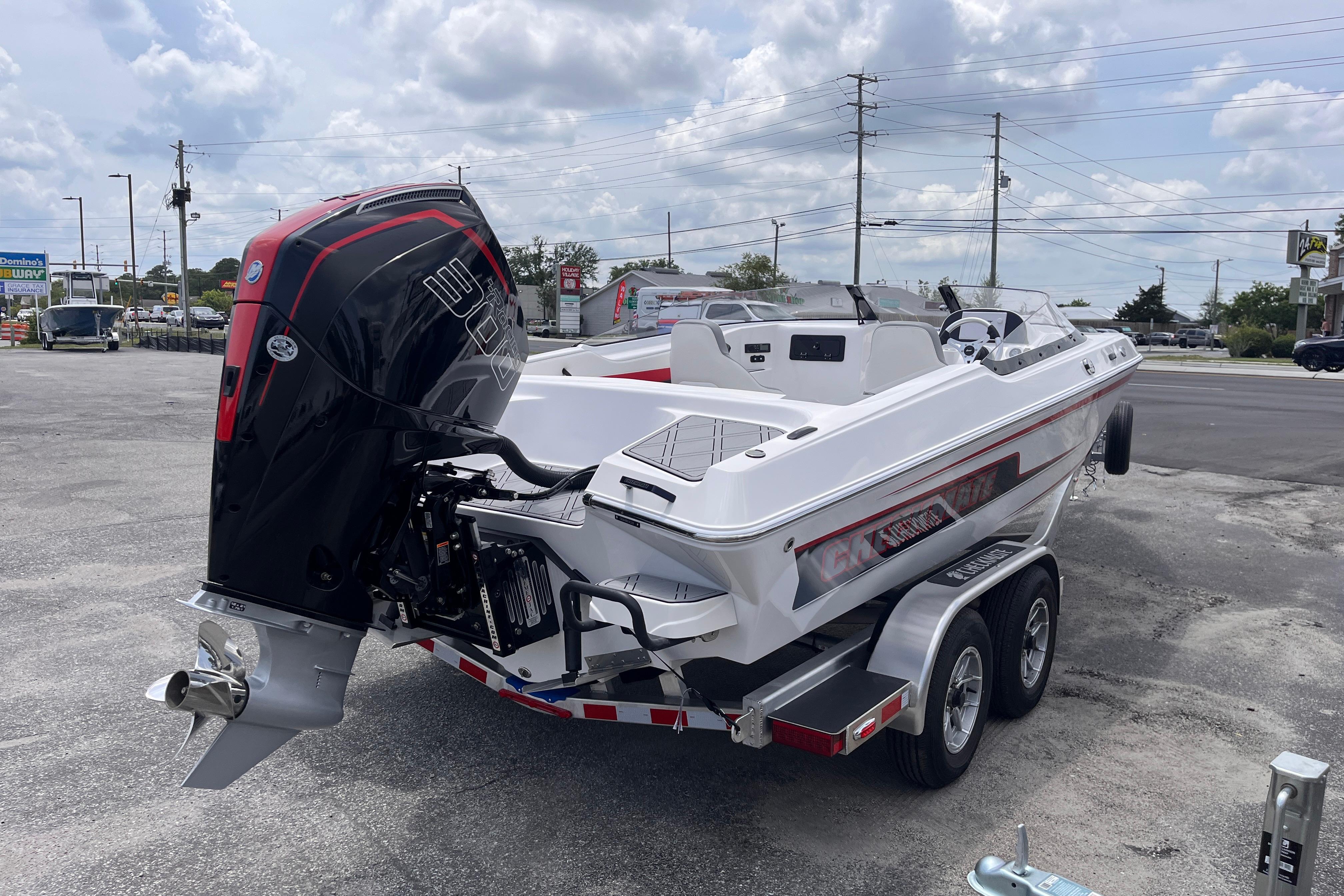 Checkmate Pulsare 2400 BRX 2025 on trailer, exterior view.
