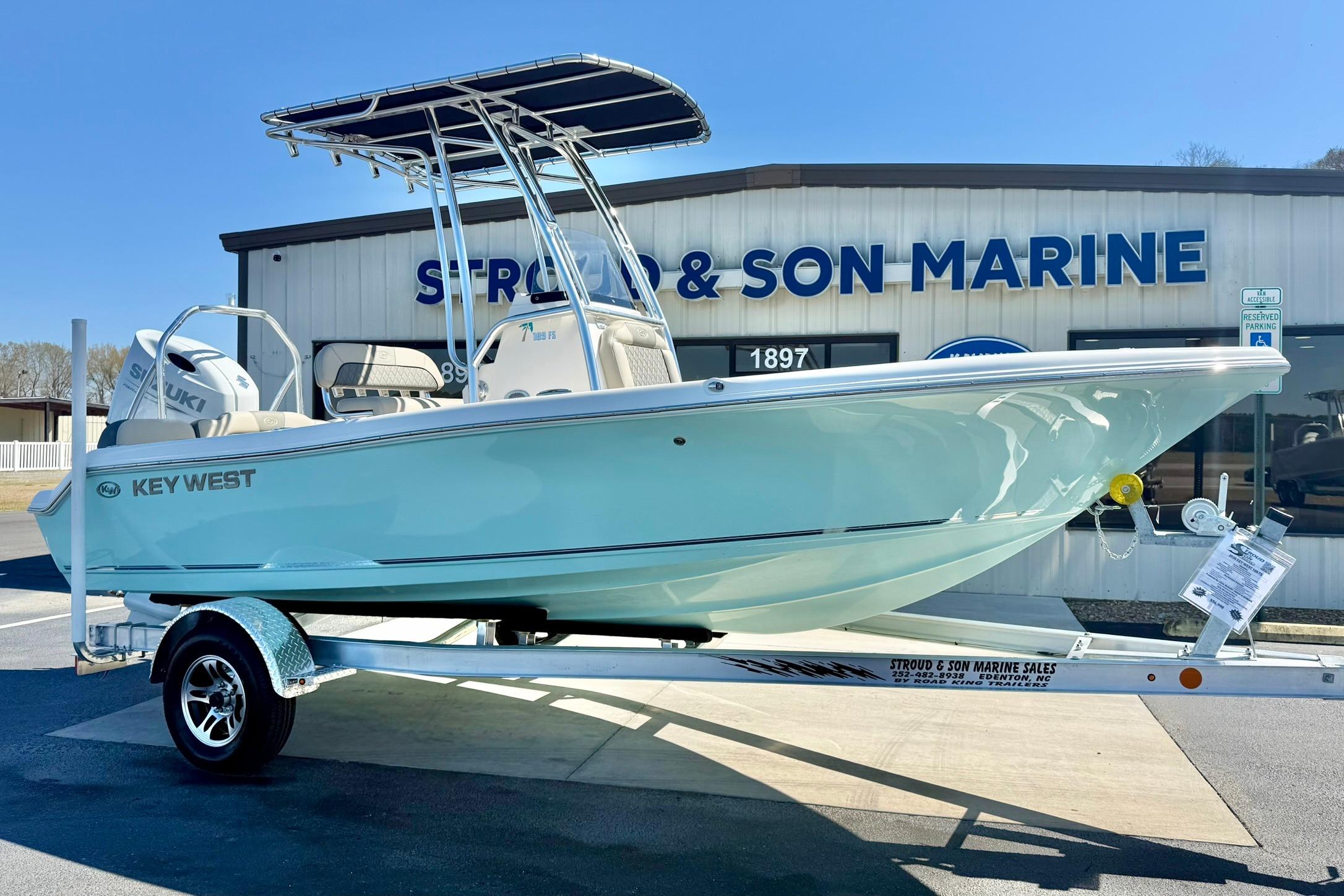 2026 Key West 189 FS boat on trailer at Stroud & Son Marine dealership.