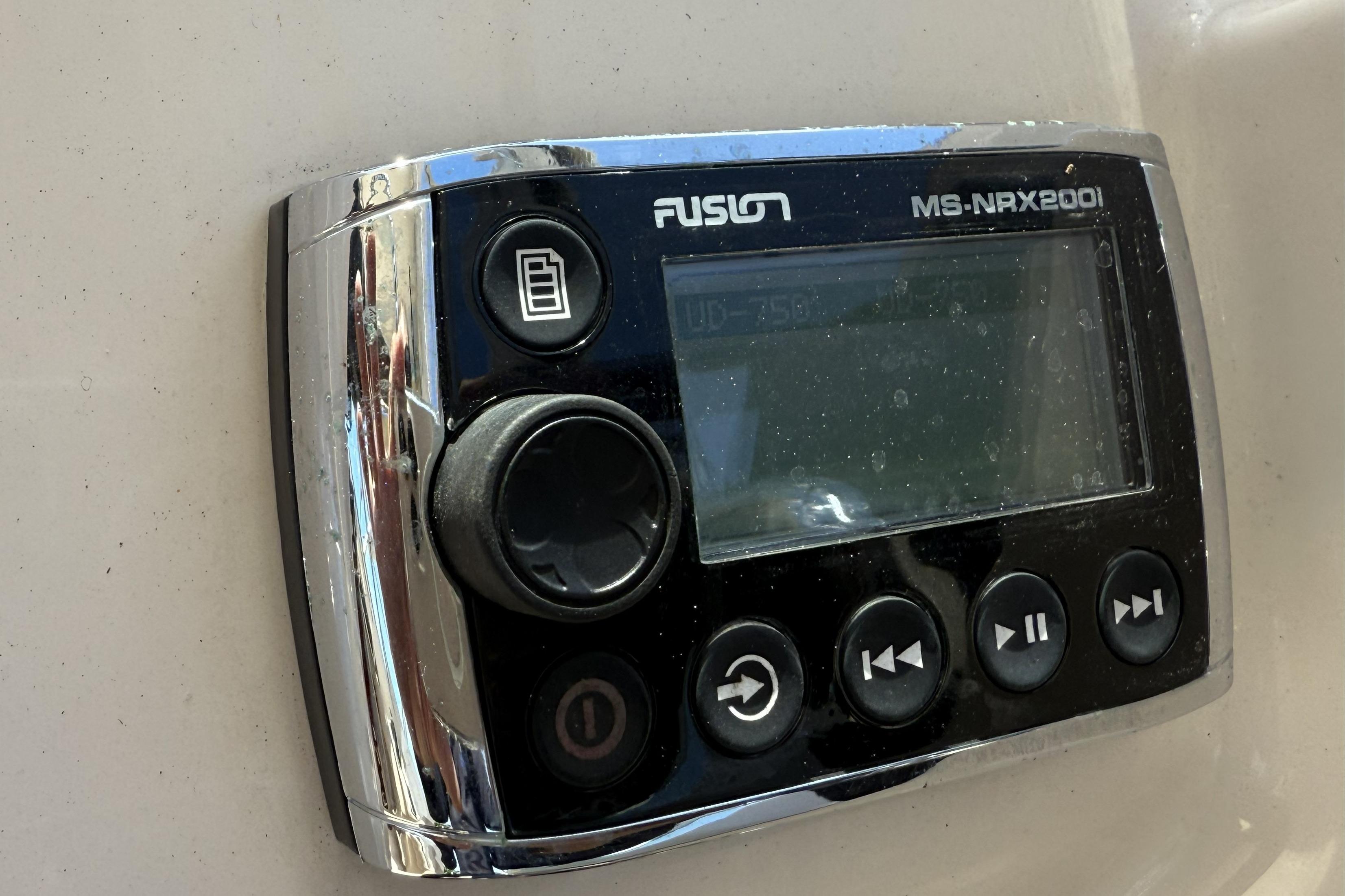 Fusion MS-NRX200i marine stereo control on 2014 Grady-White Freedom 275 boat.