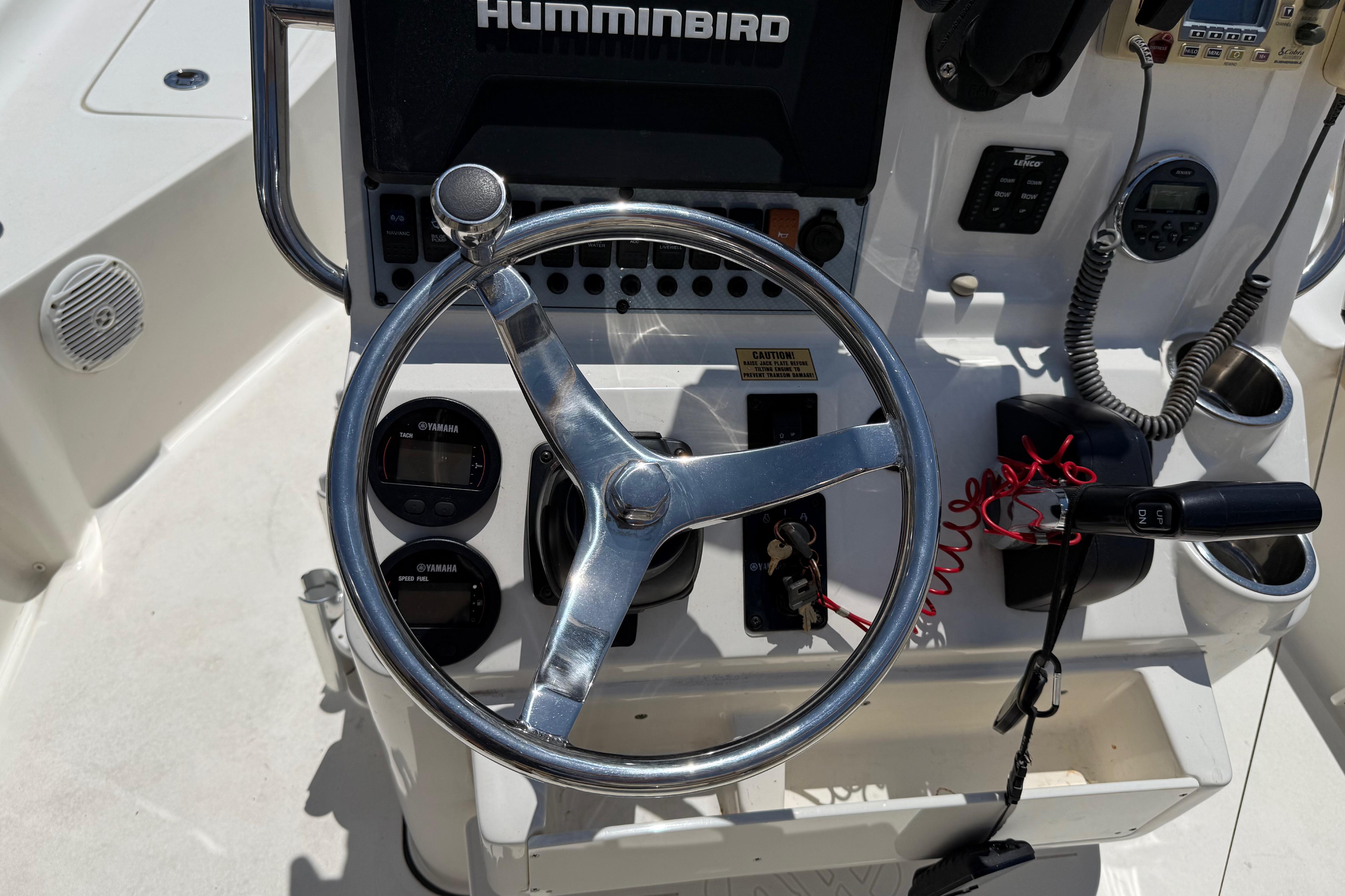 Steering console of 2019 Key West 230 Bay Reef boat with navigation equipment.