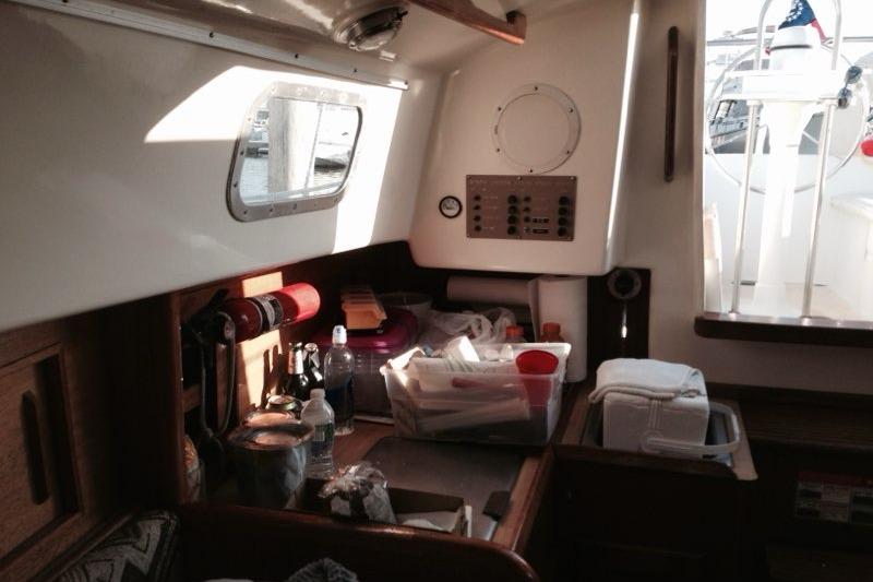 Interior of a 1980 Sloop 27.7 Bristol sailboat with nautical equipment and storage.