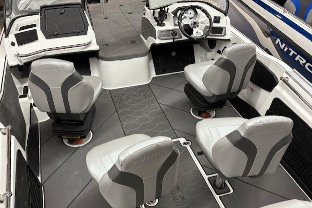 2026 Nitro ZV20 Sport Pro boat interior with four gray seats and modern dashboard.