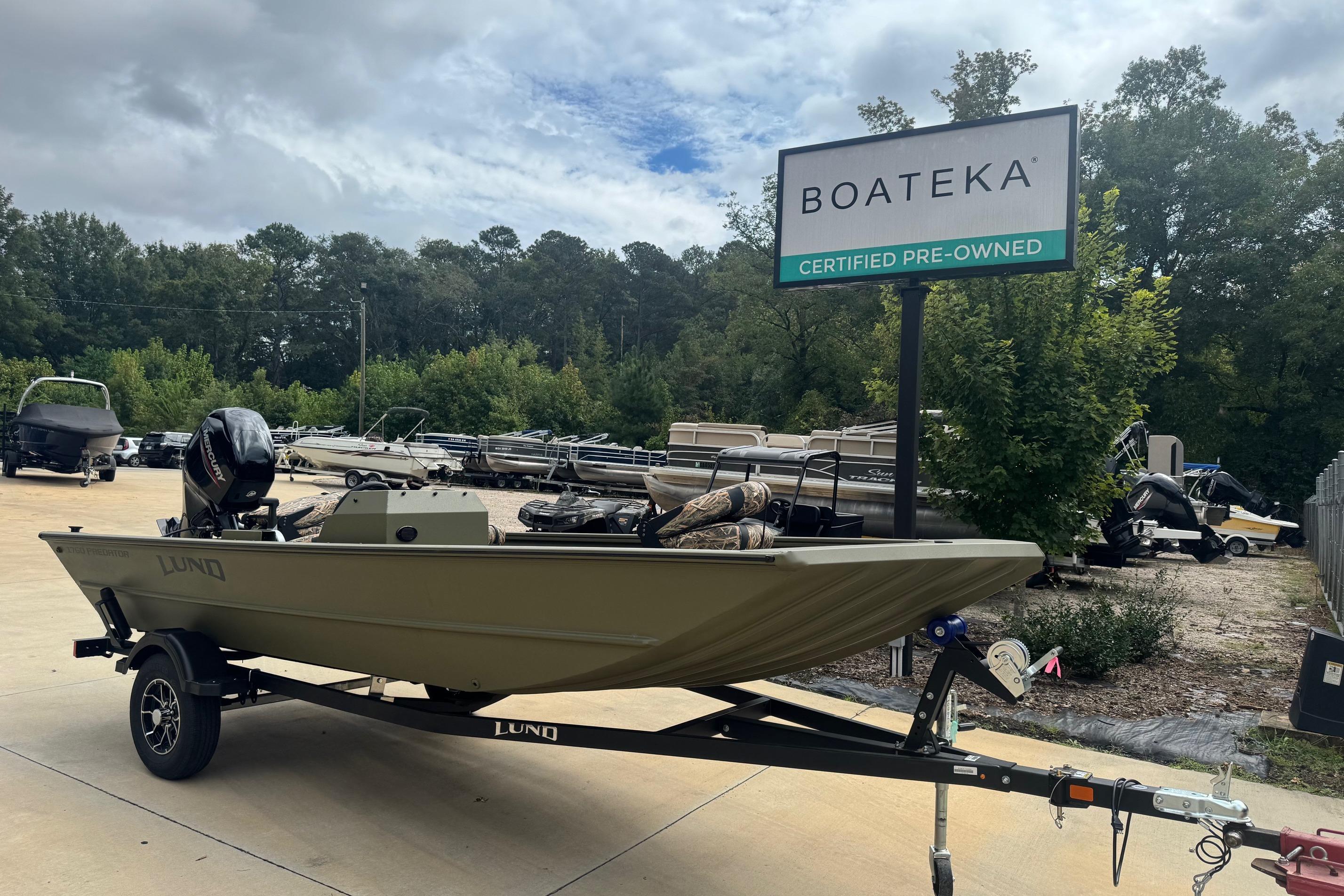 2026 Lund 1760 Predator SC boat on trailer at Boateka certified pre-owned lot.