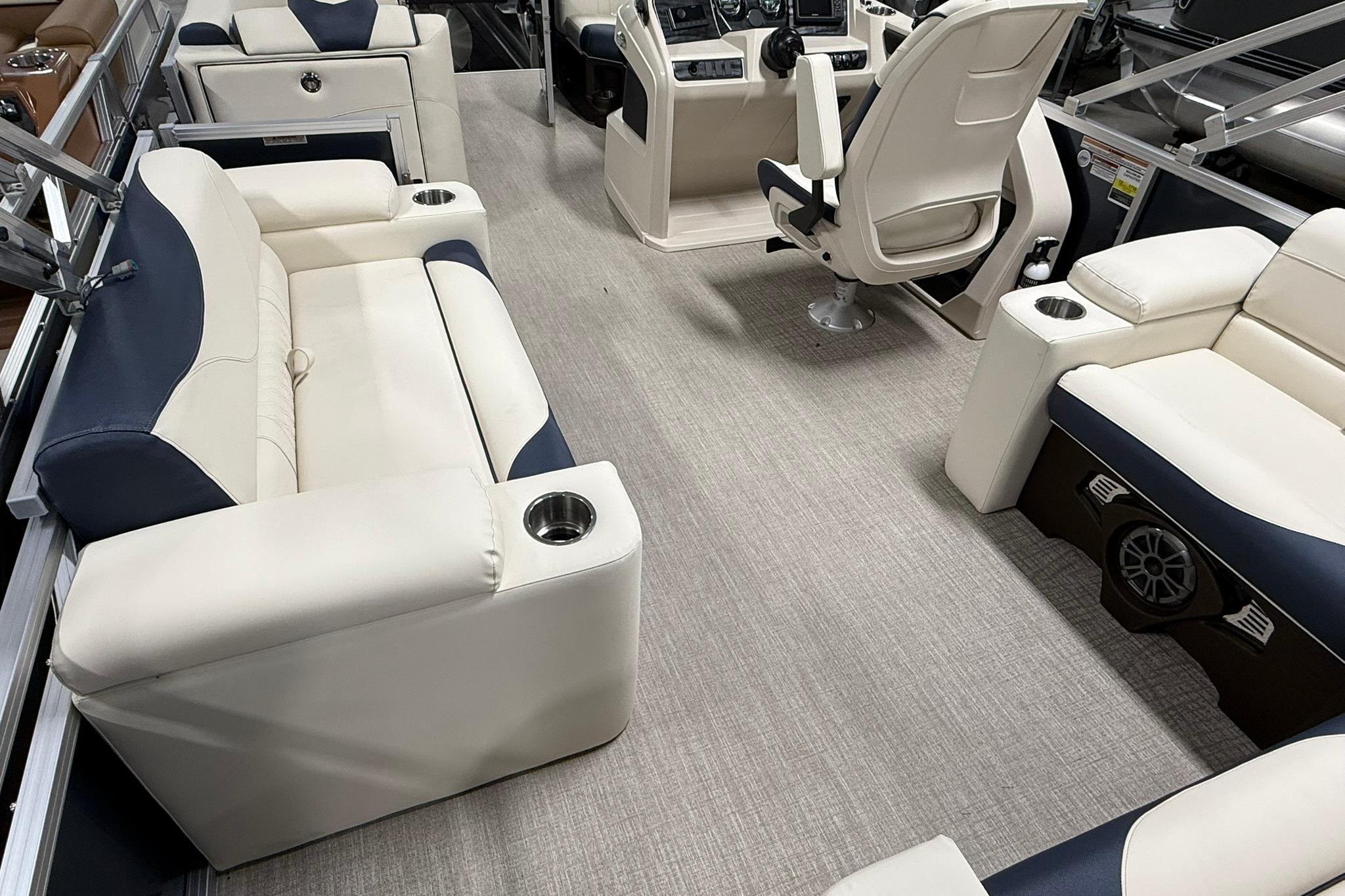 Luxurious interior of 2026 Avalon LSZ Elite 21' pontoon boat with plush seating.