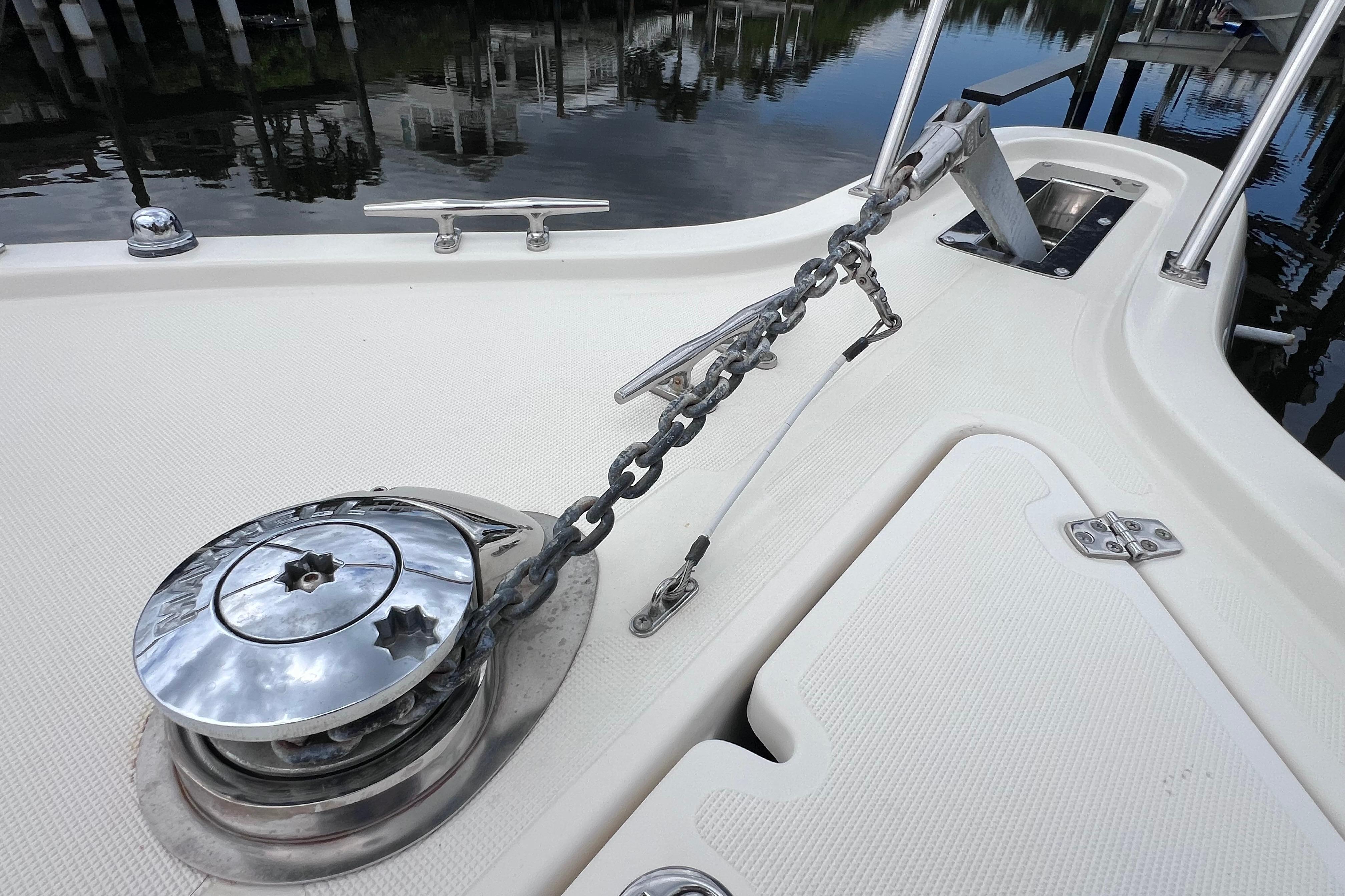 Anchor chain and winch on 2005 Pursuit 3070 Offshore boat deck.