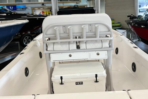 2024 Sea Fox 231 Bay boat interior with Yeti cooler and rod holders.