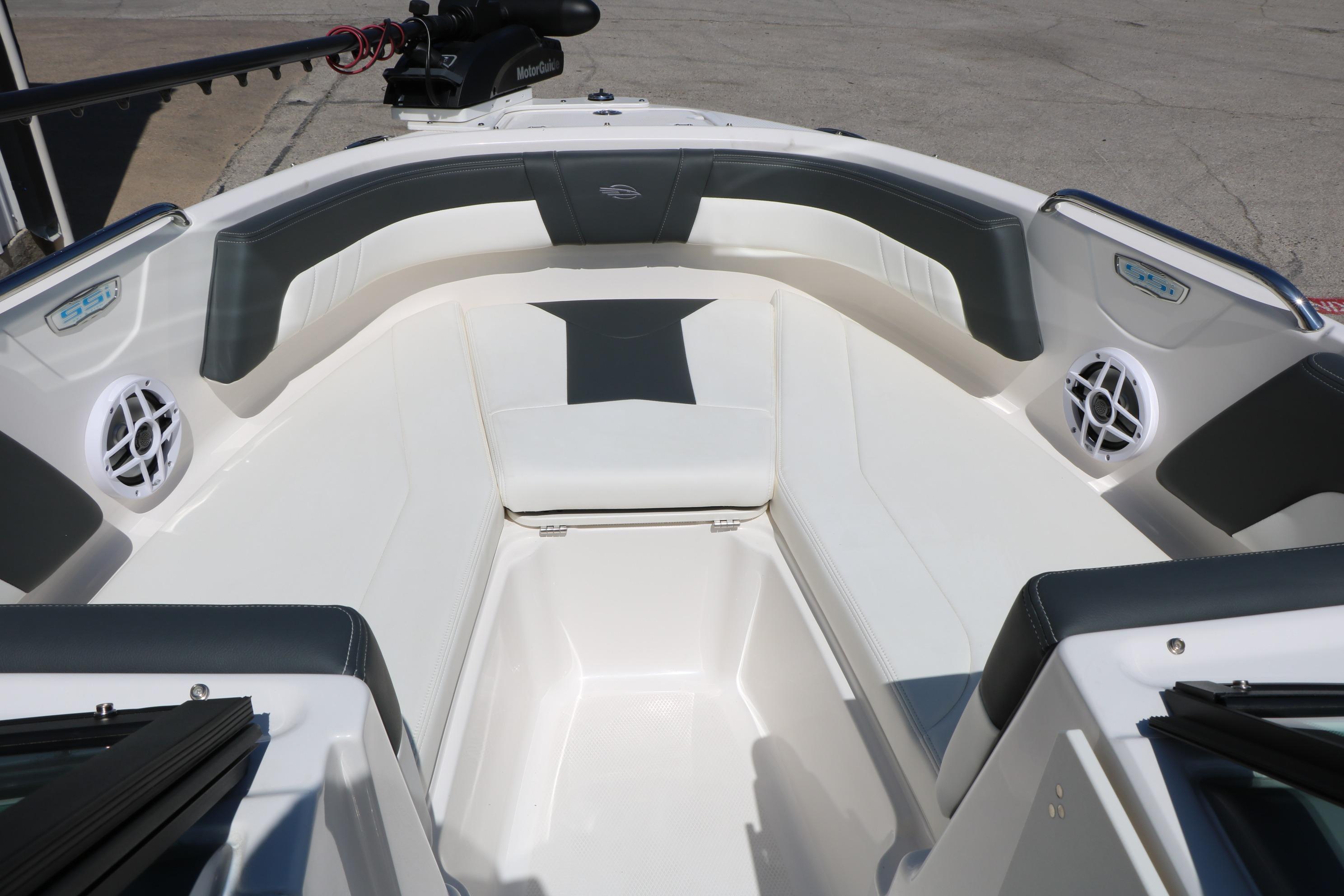 2025 Chaparral 21 SSi Ski & Fish boat interior with seating and speakers.