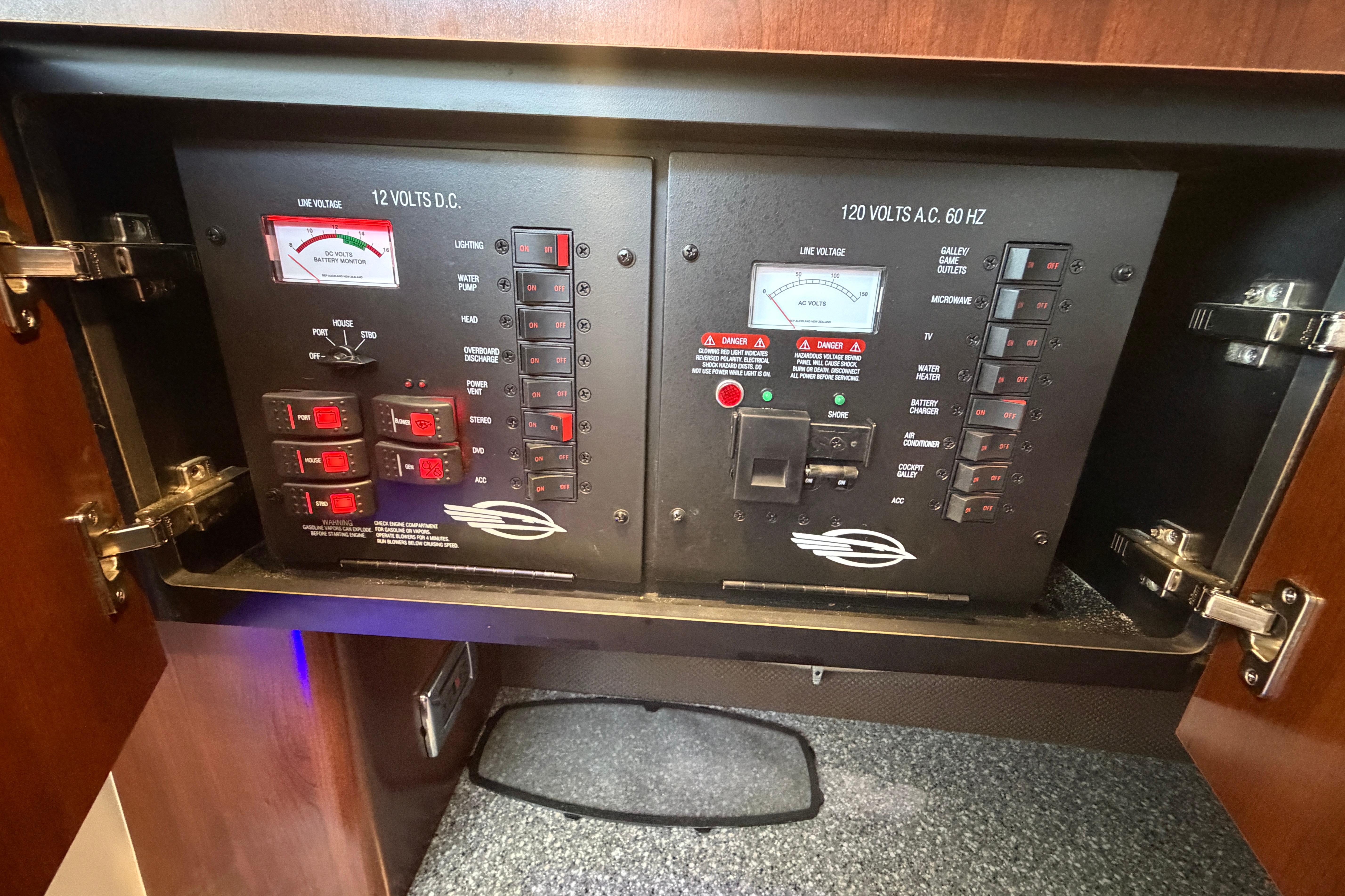 Electrical control panel on a 2018 Chaparral 347 SSX boat, featuring switches and meters.
