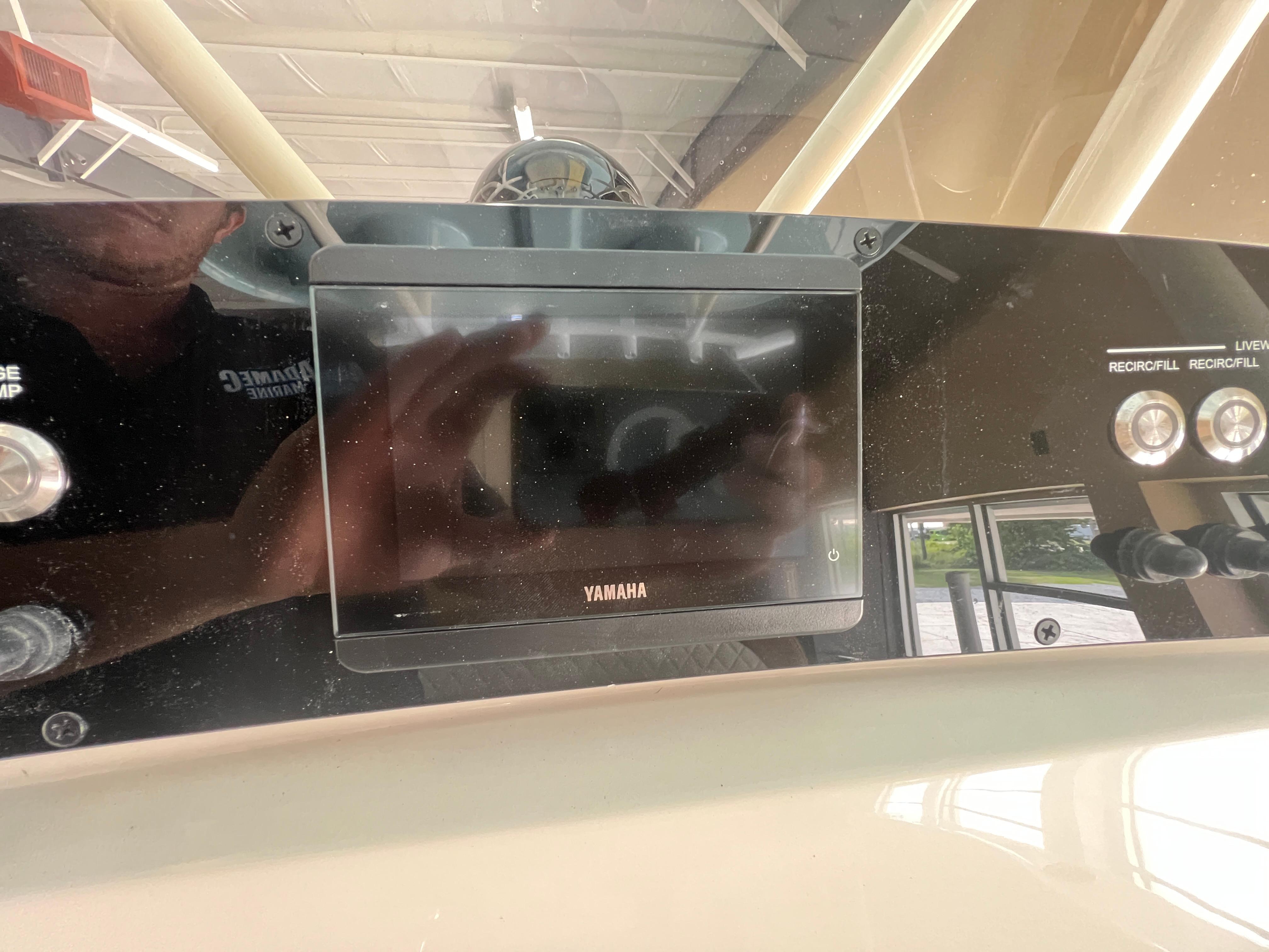 Control panel of 2026 Pioneer 220 Bay Sport boat with Yamaha display.