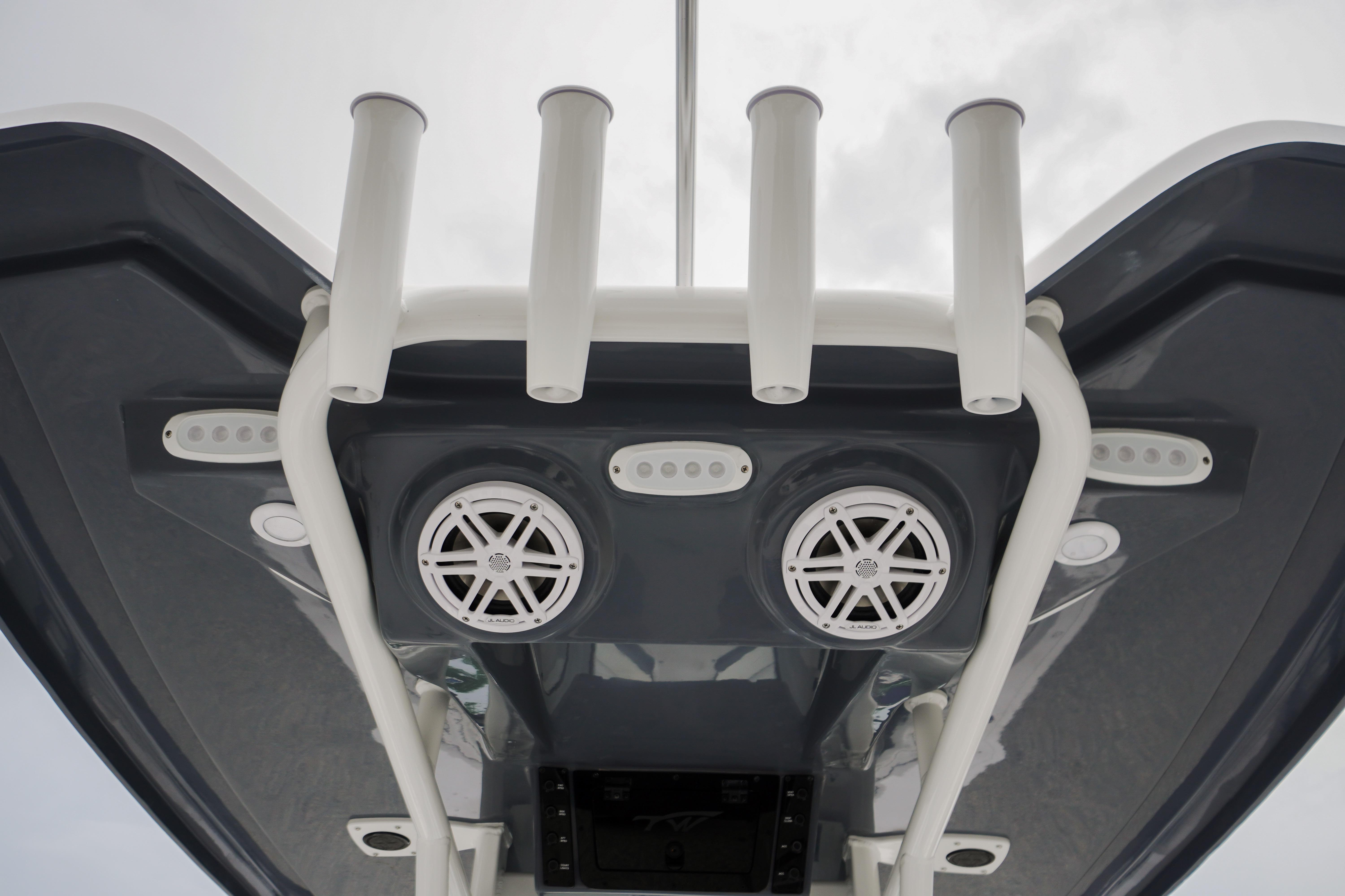 Tidewater 232 SS 2026 boat speakers and rod holders on T-top, viewed from below.