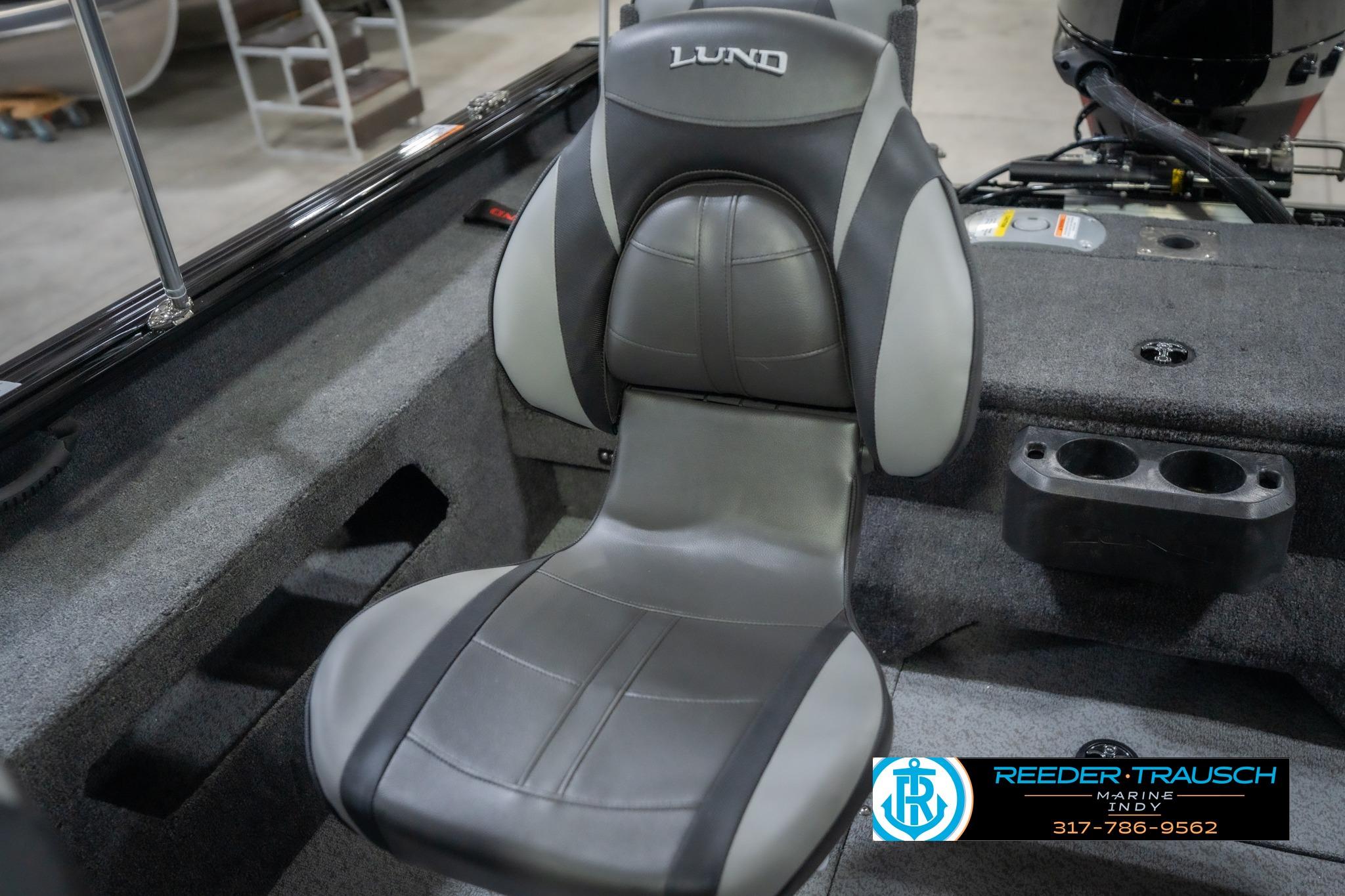 2026 Lund 2075 Impact XS boat seat, gray and black, with cup holders.
