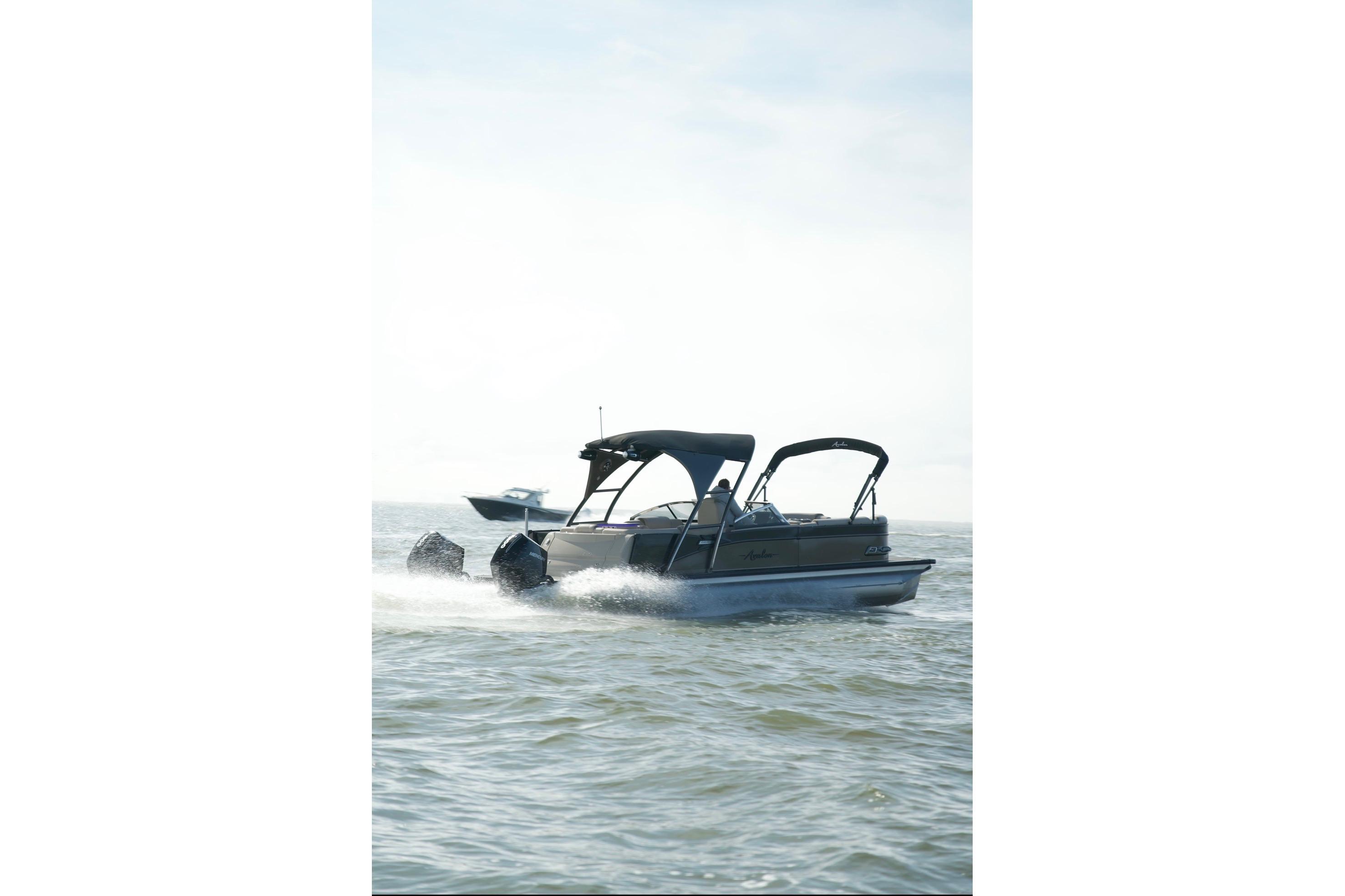 2022 Avalon Catalina Platinum Cruise pontoon boat cruising on open water.